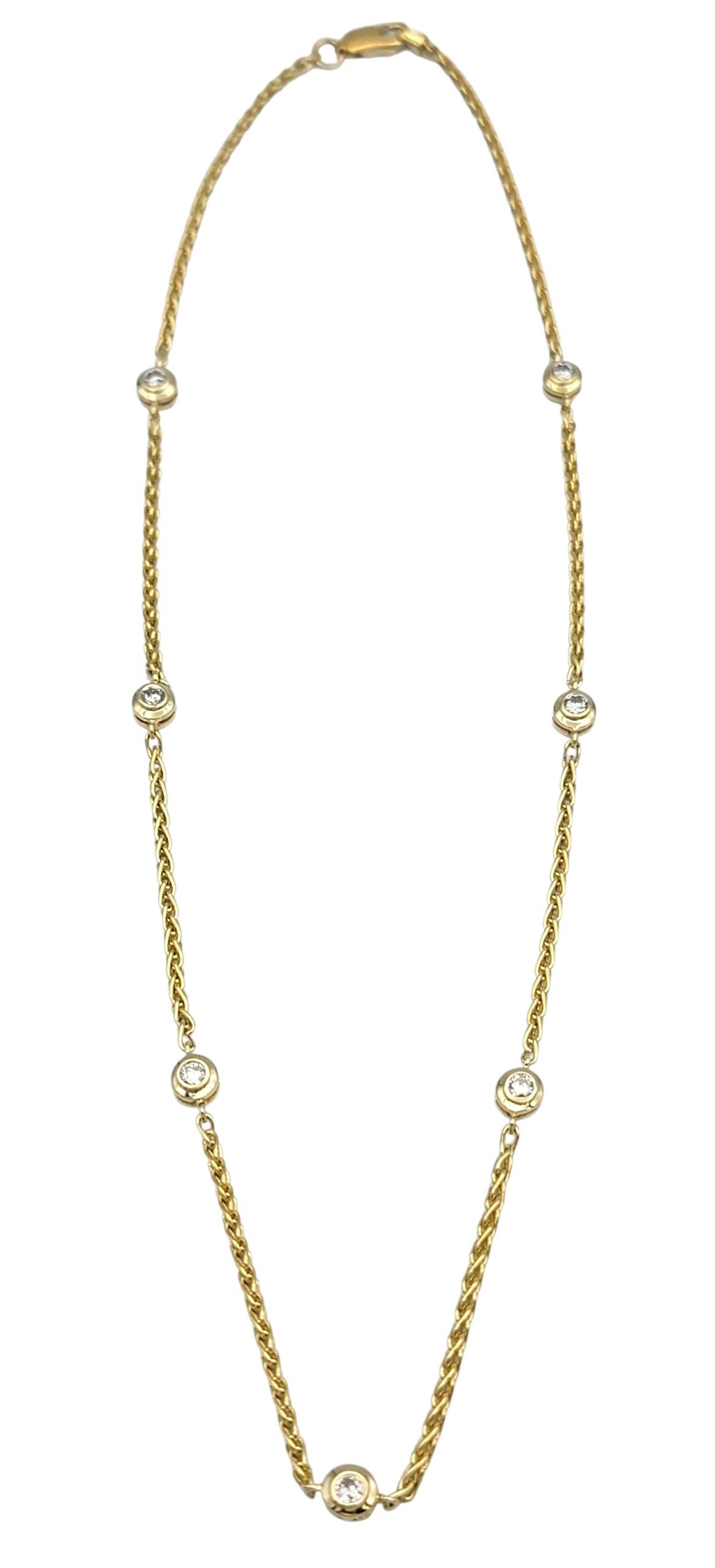 Contemporary Bezel Set Round Diamond Wheat Chain Station Necklace in 18 Karat Yellow Gold For Sale