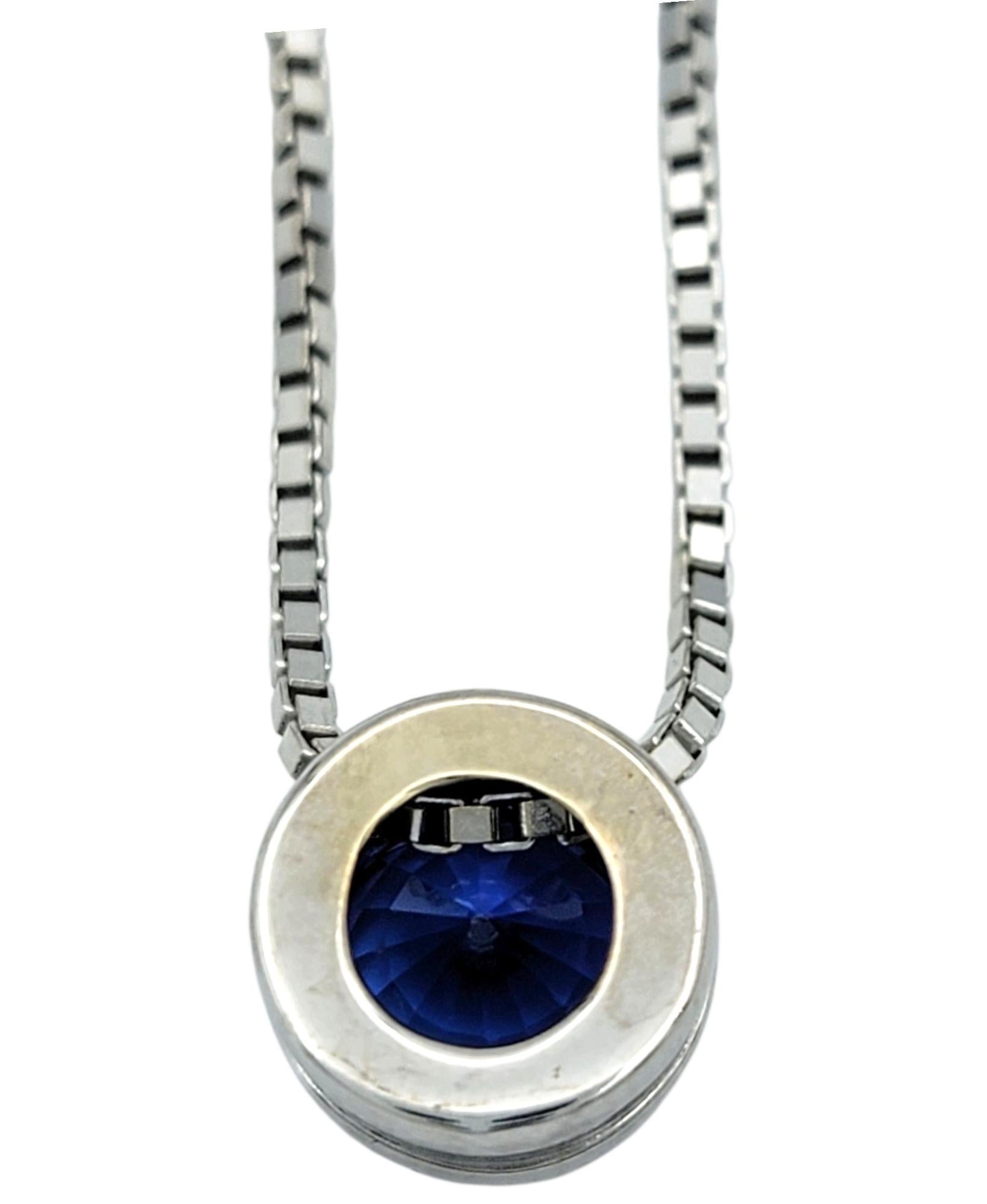 Donna Bezel Set Tanzanite Solitaire Pendant Necklace with Box Chain in 14 Karat Gold in vendita