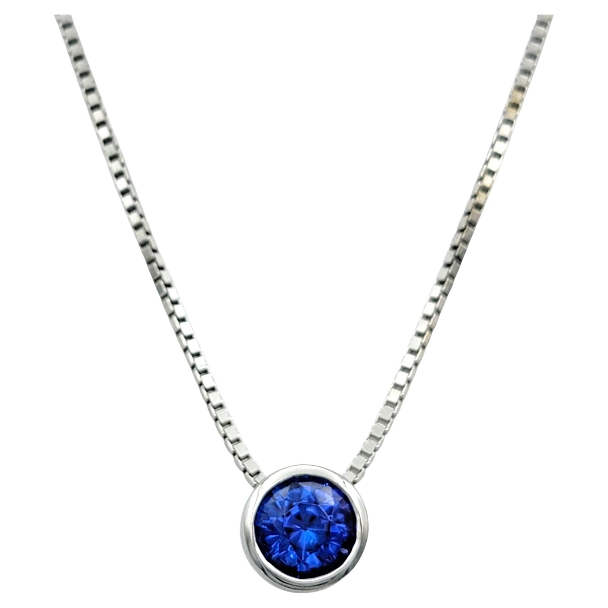 Bezel Set Tanzanite Solitaire Pendant Necklace with Box Chain in 14 Karat Gold in vendita