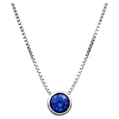 Bezel Set Tanzanite Solitaire Pendant Necklace with Box Chain in 14 Karat Gold