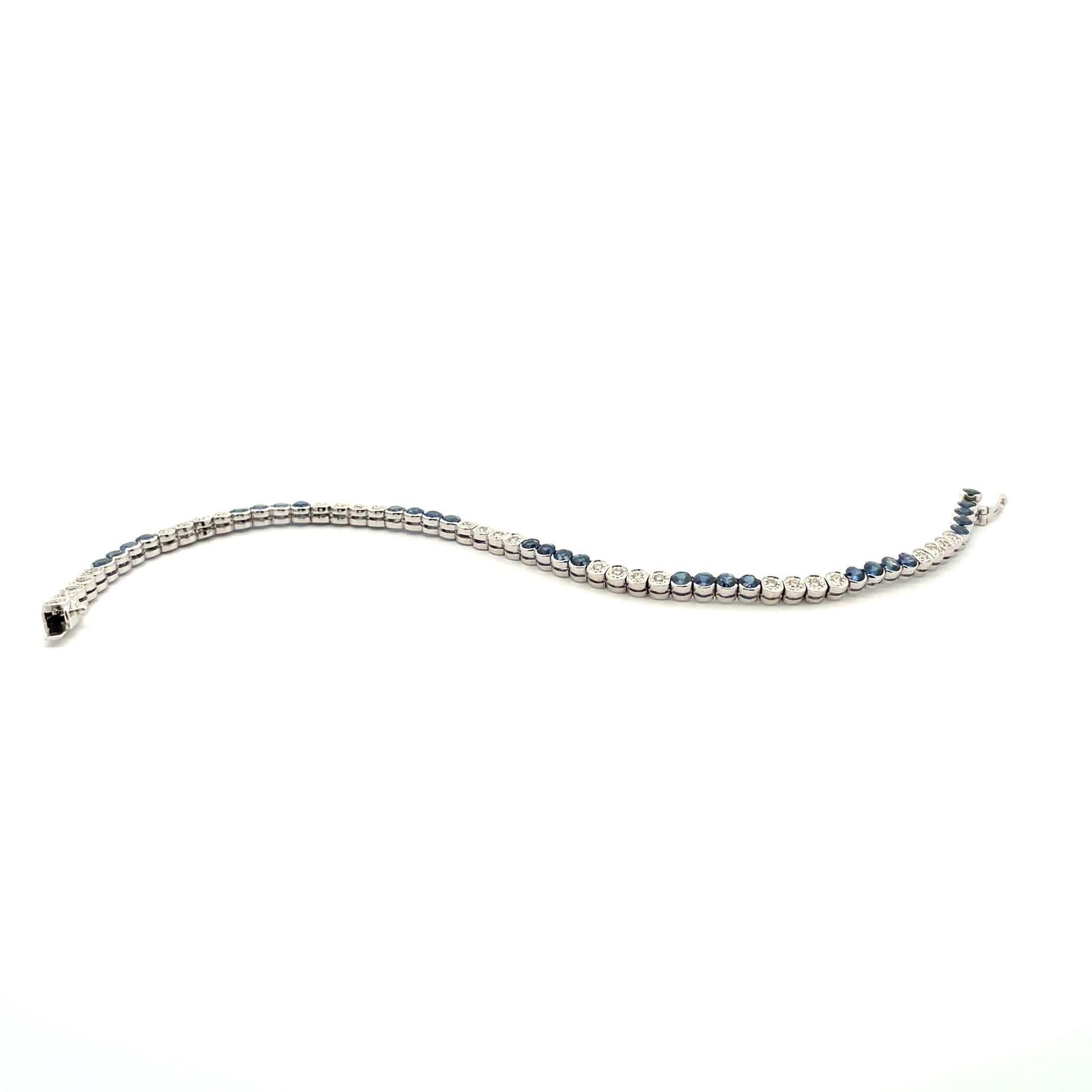 Contemporary Bezel & Tube Bracelet With Blue Sapphires & White Diamonds in 18 Kt White Gold For Sale