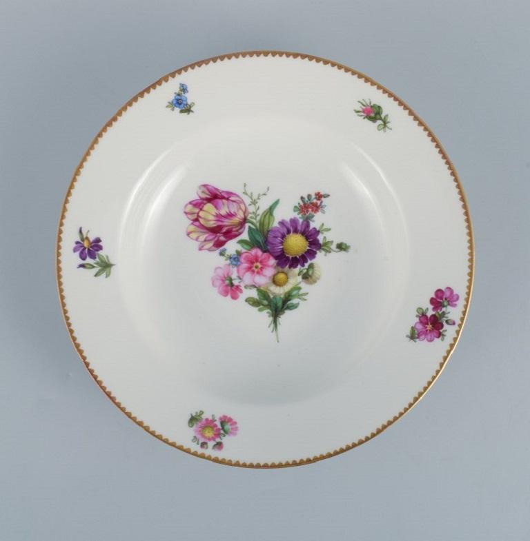 B&G, Bing & Grondahl Saxon flower.
Four deep plates decorated with flowers and gold rim.
circa 1920s.
In perfect condition.
Marked.
First factory quality.
Dimensions: D 24.0 x H 5.0 cm.