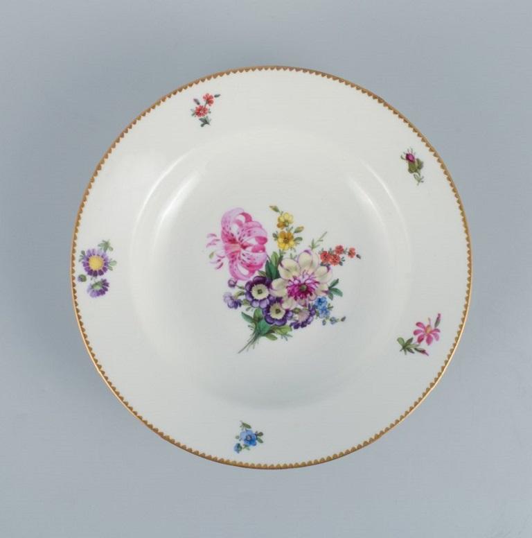 B&G, Bing & Grondahl Saxon flower.
Six deep plates decorated with flowers and gold rim.
circa 1920s.
In perfect condition.
Marked.
First factory quality.
Dimensions: D 24.0 x H 5.0 cm.