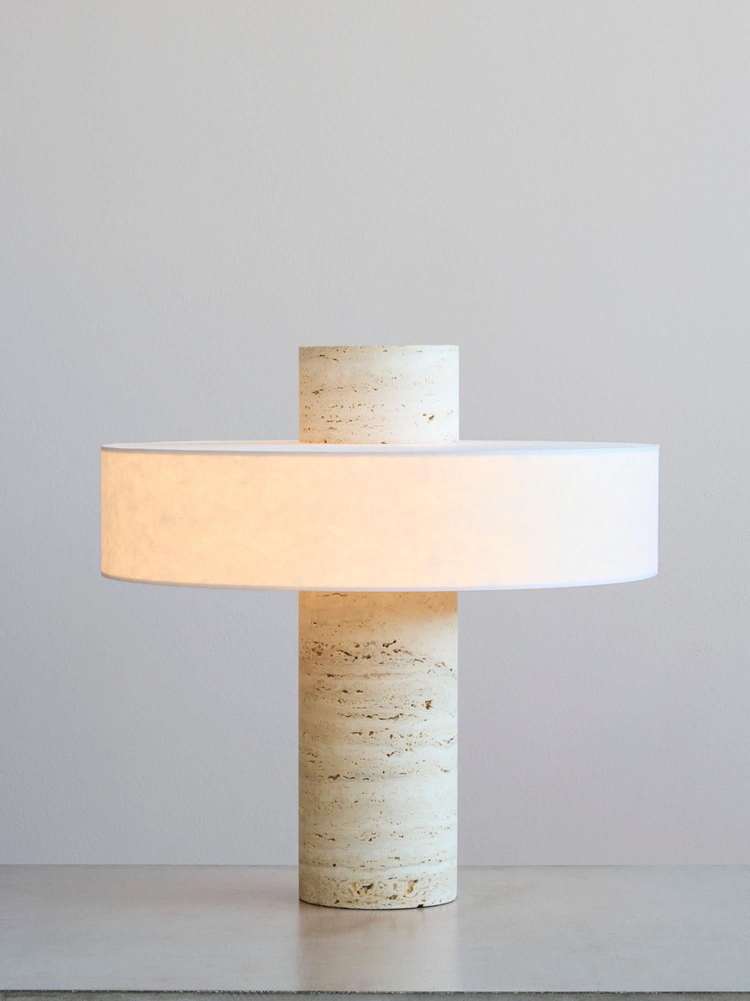 BHA Table Lamp in Travertine and Handcrafted Shoji Paper by Megarisiotis
Dimensions: Ø 52 x H 52 cm.
Materials: Travertine, paper, and acrylic.

All our lamps can be wired according to each country. If sold to the USA it will be wired for the USA