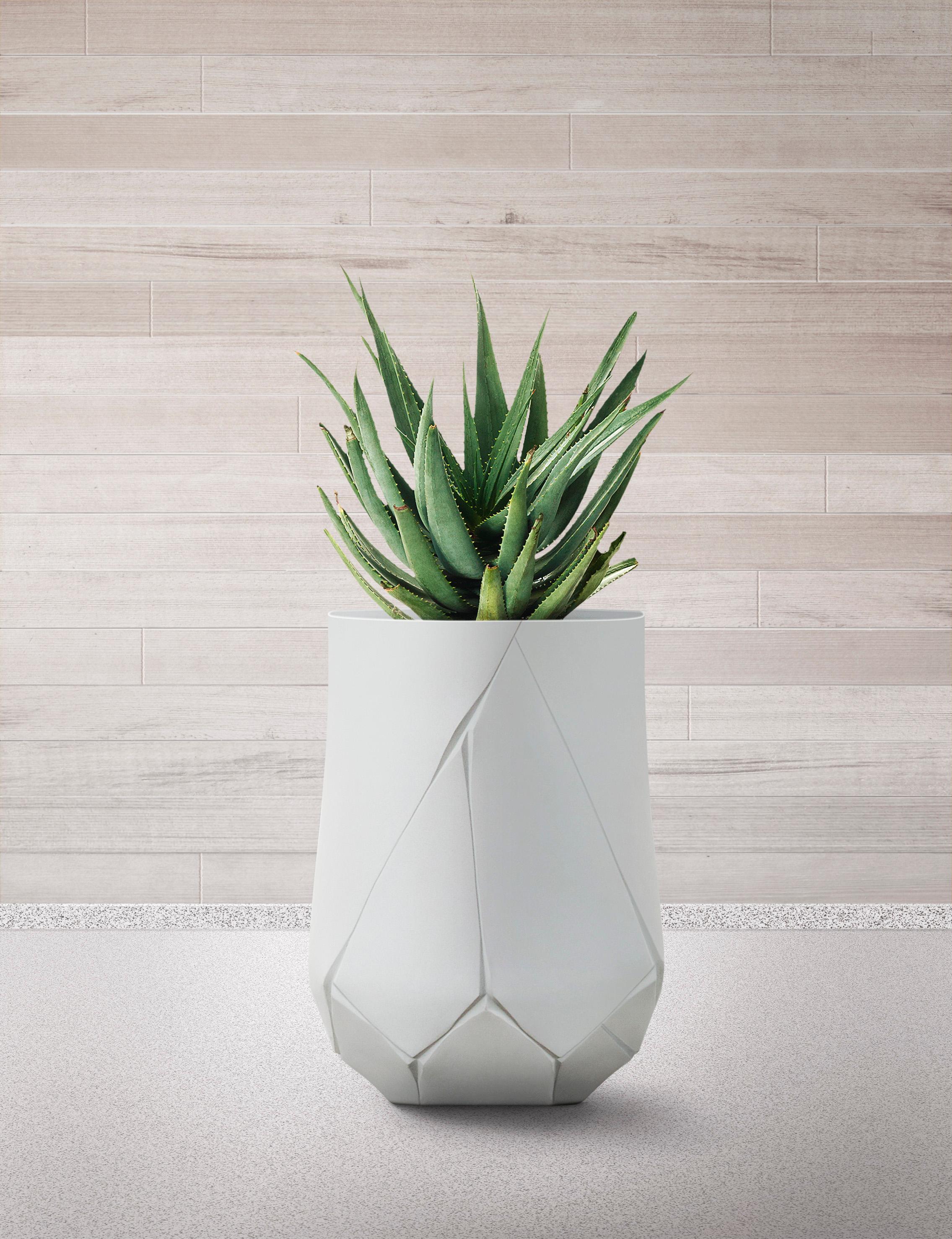 Bhaca XS White Planter by Indigenus
Designed by Andile Dyalvane
Dimensions: Ø 45,2 x H 56,5 cm.
Materials: Stone.
Weight: 25 kg.

Different colors and sizes are available. Please contact us.

The Bhaca is a completely personal and original range of
