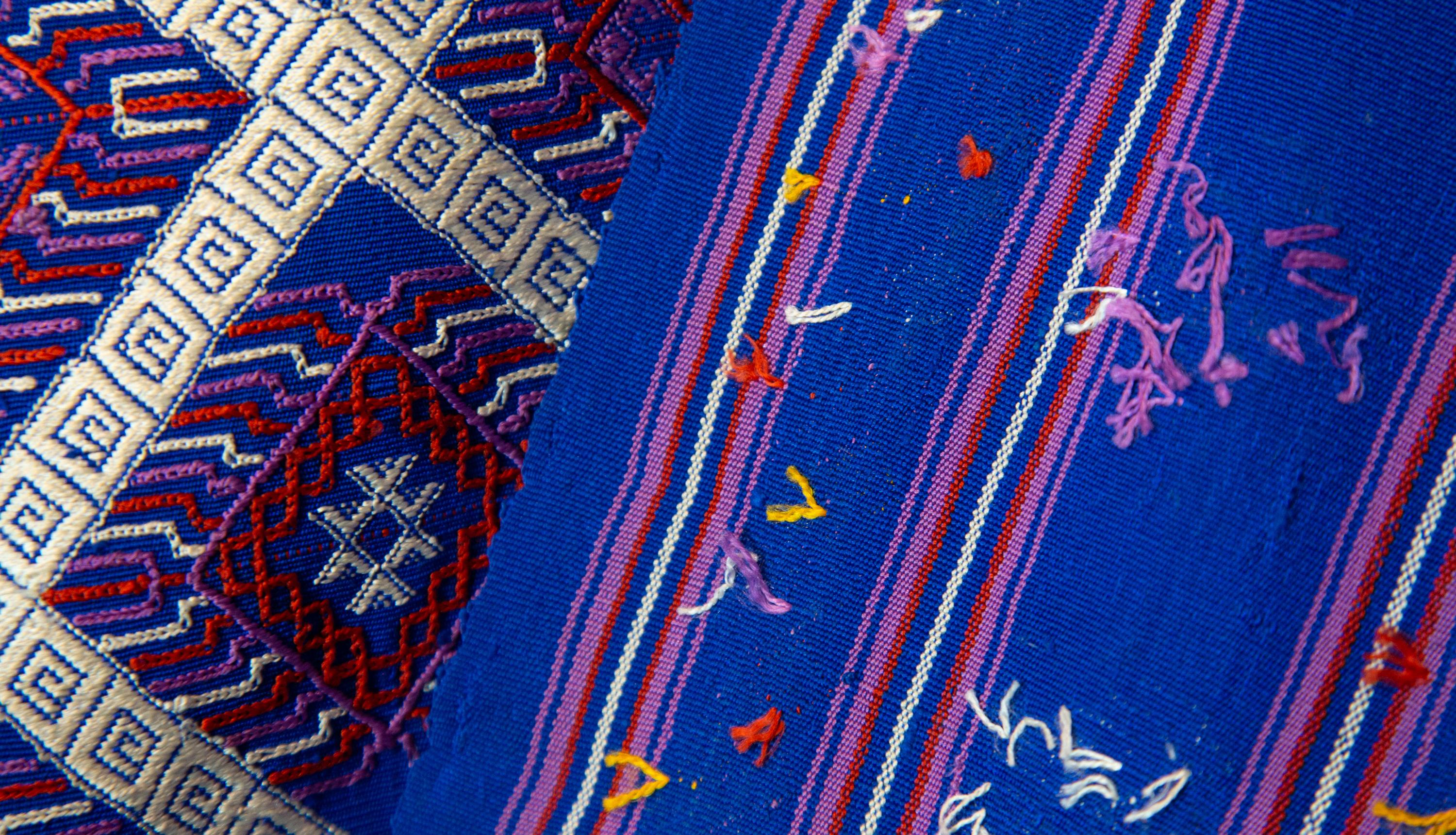 Bhutanese silk woven Kira Textile, Purple. From the royal weavers of Bhutan, this kira textile is a rectangular weaving worn as an ankle length dress by Bhutanese women. This example was originally woven for her Majesty Gyalyum (Queen Mother) Sangay