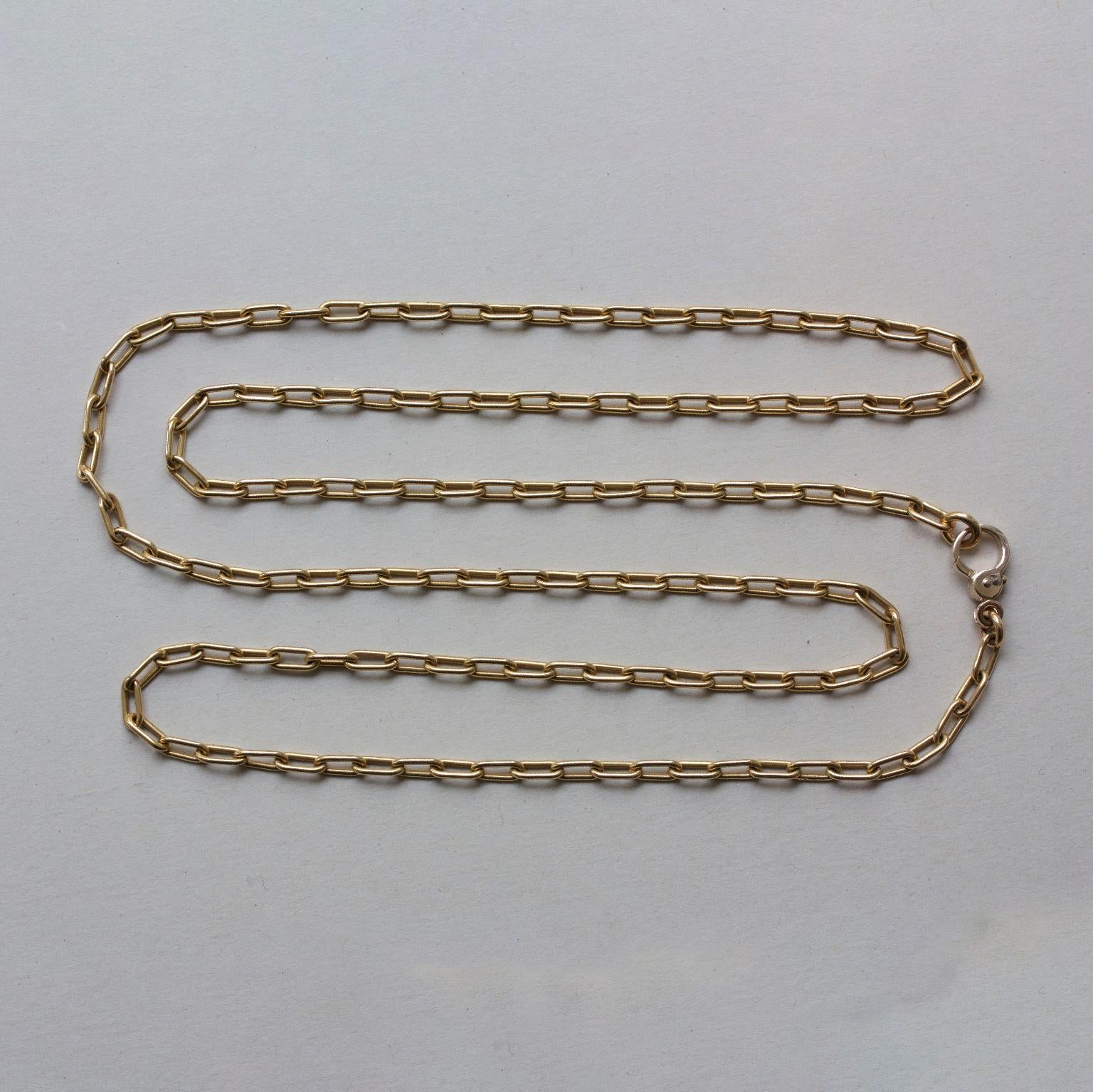 A vintage 18 carat yellow gold long chain with a paperclip link with a large 18 carat gold white gold clasp, signed: Pomellato, Italy, circa 1980.

weight: 35.14 grams
length: 84 cm
width: 3 mm