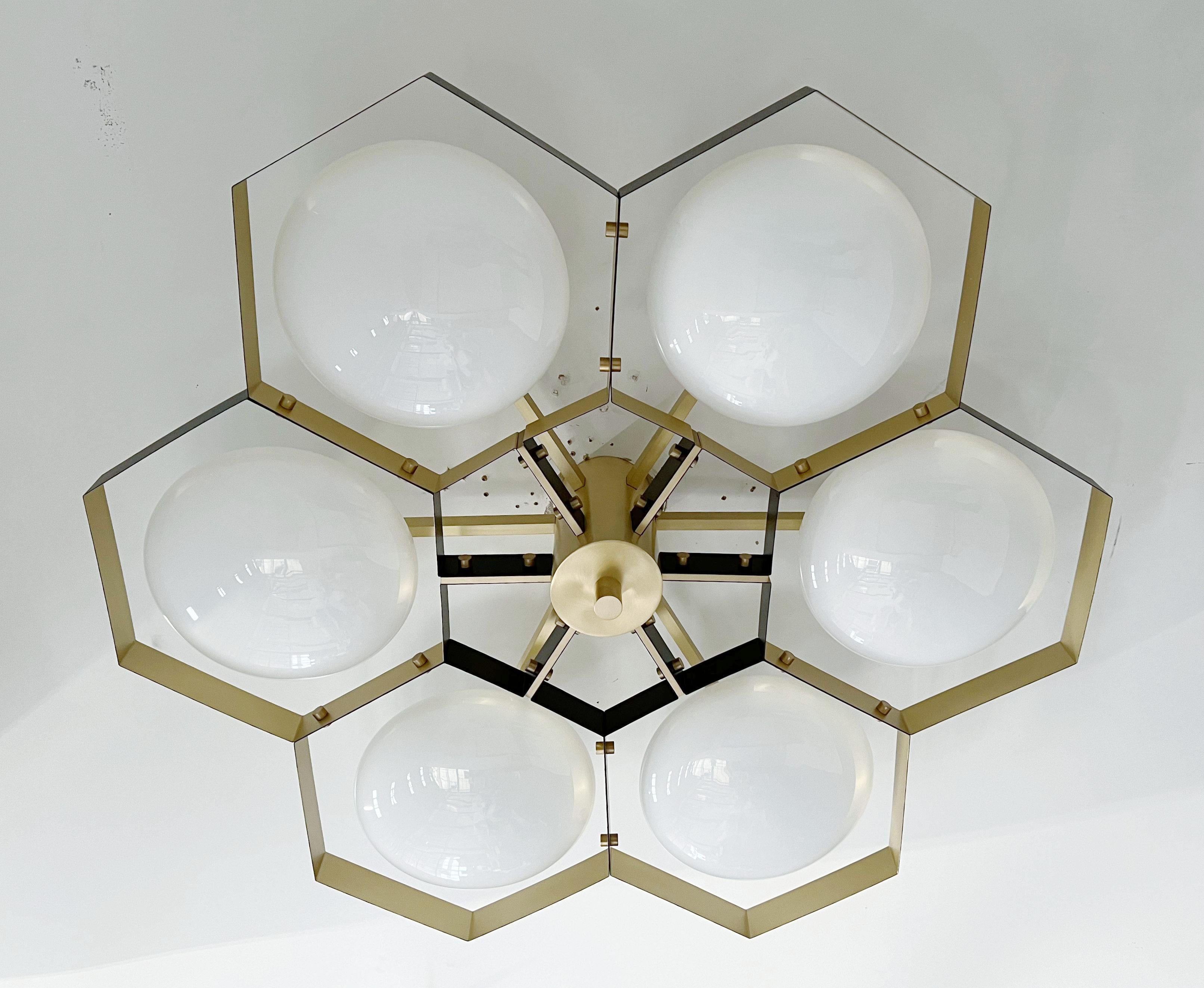 Italian flush mount with Murano glass shades mounted on solid brass frame / Made in Italy
Designed by Fabio Ltd, inspired by Angelo Lelli and Arredoluce styles
6 lights / E12 or E14 / max 40W each
Measures: Diameter 43 inches / height 10