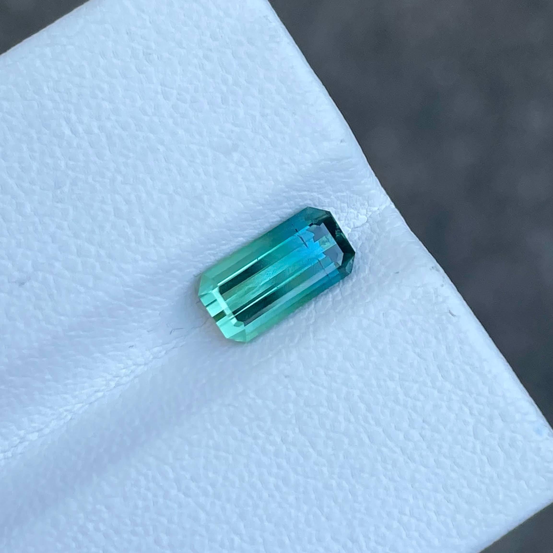 Weight 1.75 carats 
Dimensions 9.9x5.1x3.9 mm
Origin Afghanistan
Clarity VVS
Treatment None
Shape rectangular
Cut Emerald Step Cut




The Bi-Color Tourmaline, a captivating gemstone weighing 1.75 carats, is a true marvel hailing from the rich mines