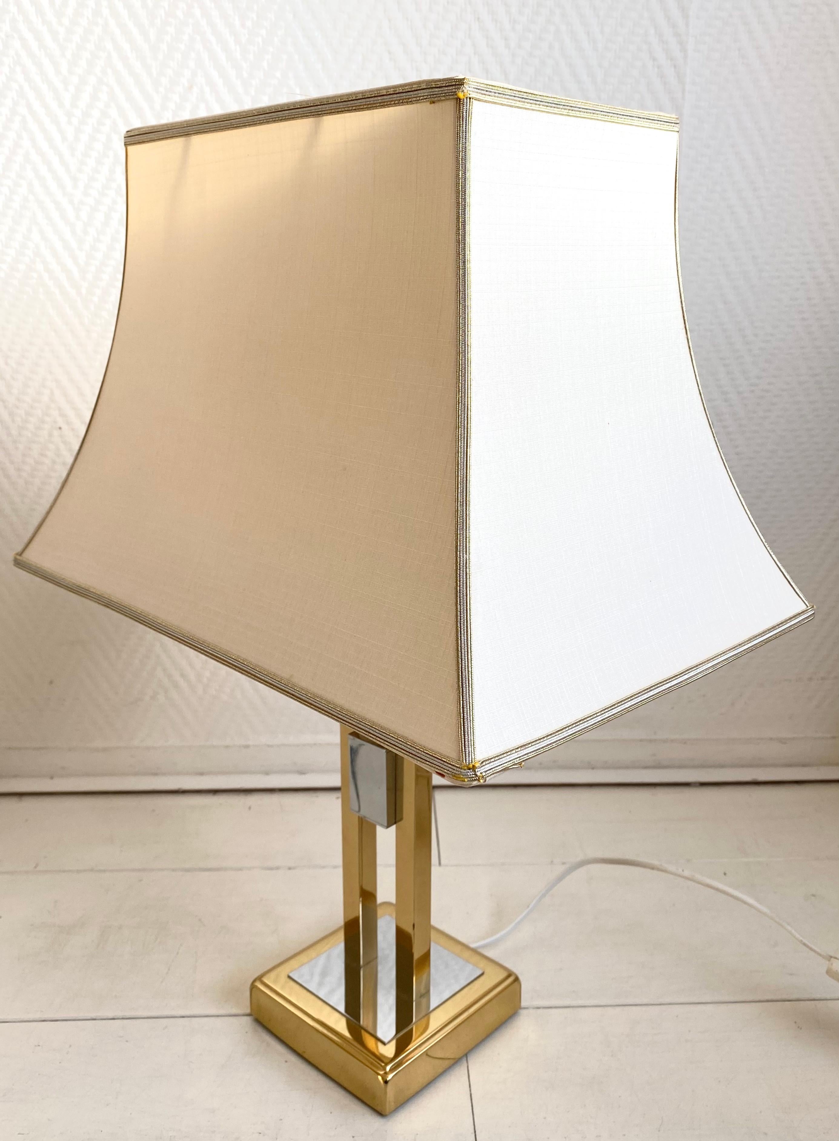 Gorgeous, Bi-color, sky-scraper table lamp attr. To Herda Holland. Very nice piece with original, shade. The shade has light wear as two slight stains. Gorgeous piece.