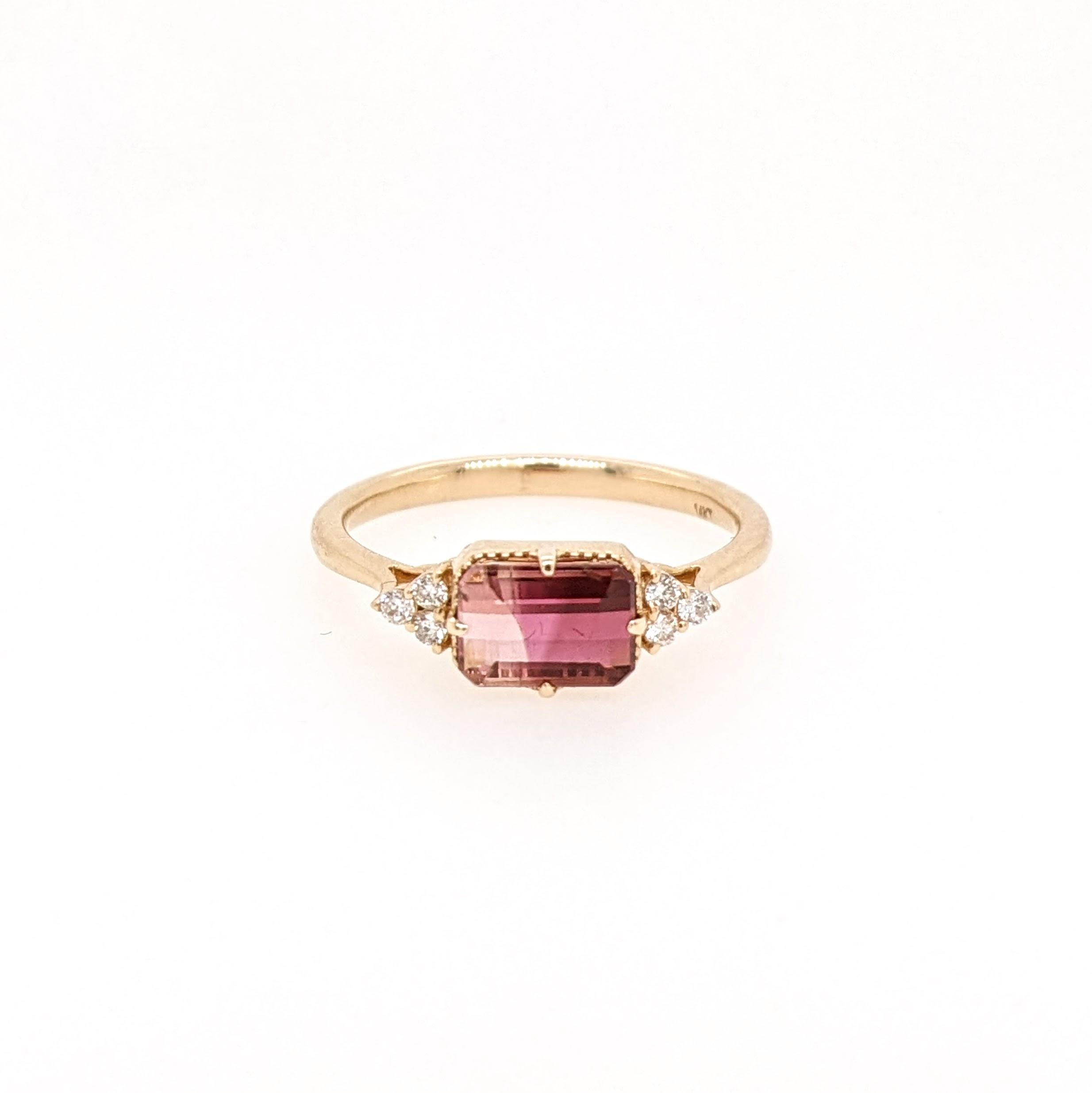 This ring features a beautiful bi-color tourmaline in a classic NNJ Designs ring setting with sparkling natural diamonds all set in 14k yellow gold. A gorgeous modern look that's perfectly balanced between minimalist and
