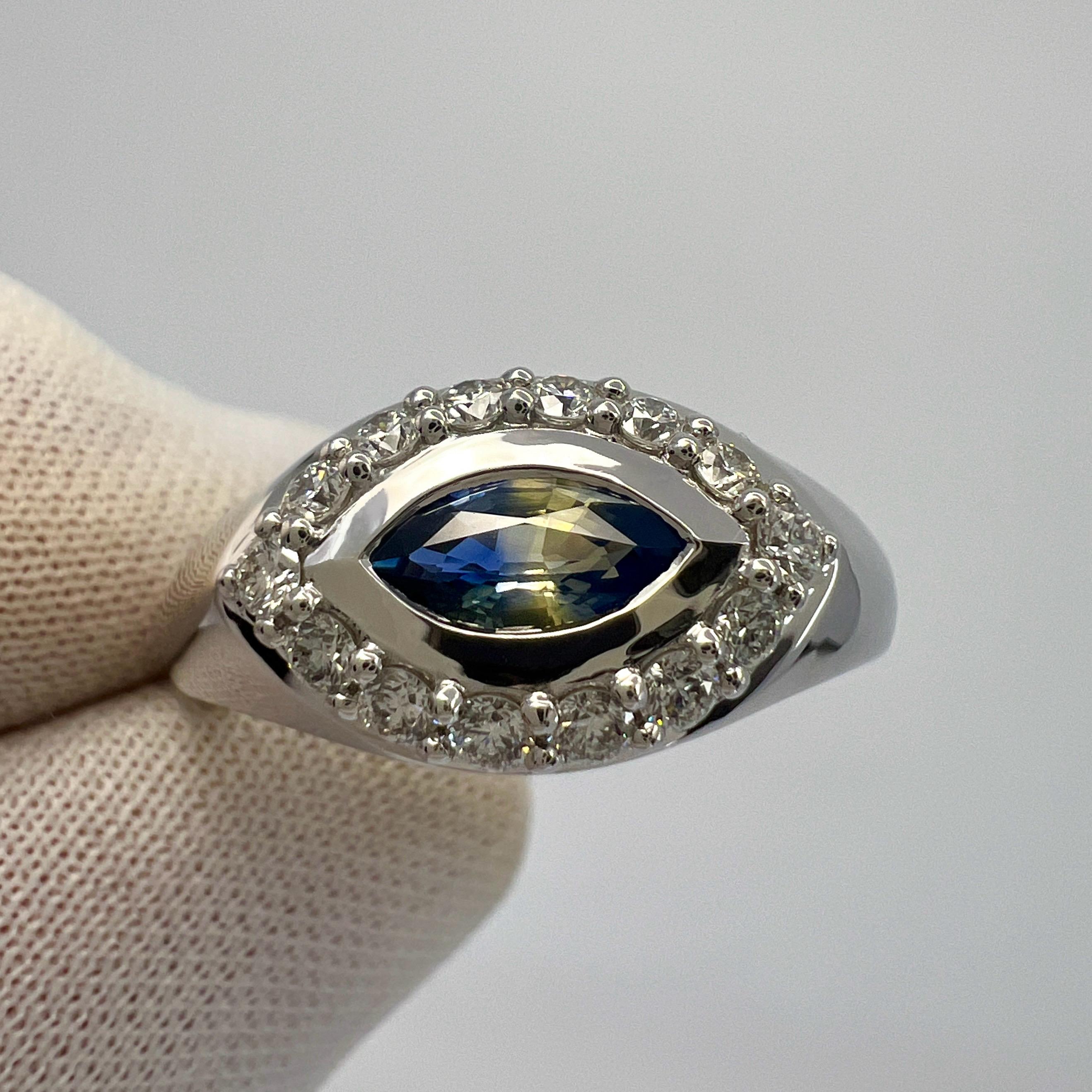 Unique Natural Bi Colour Marquise Cut Sapphire And Diamond 18k White Gold Signet Style Ring. 0.92 Total Carat.

Beautiful 0.56 Carat centre sapphire with a unique blue yellow bi colour effect and an excellent marquise cut. Also has excellent