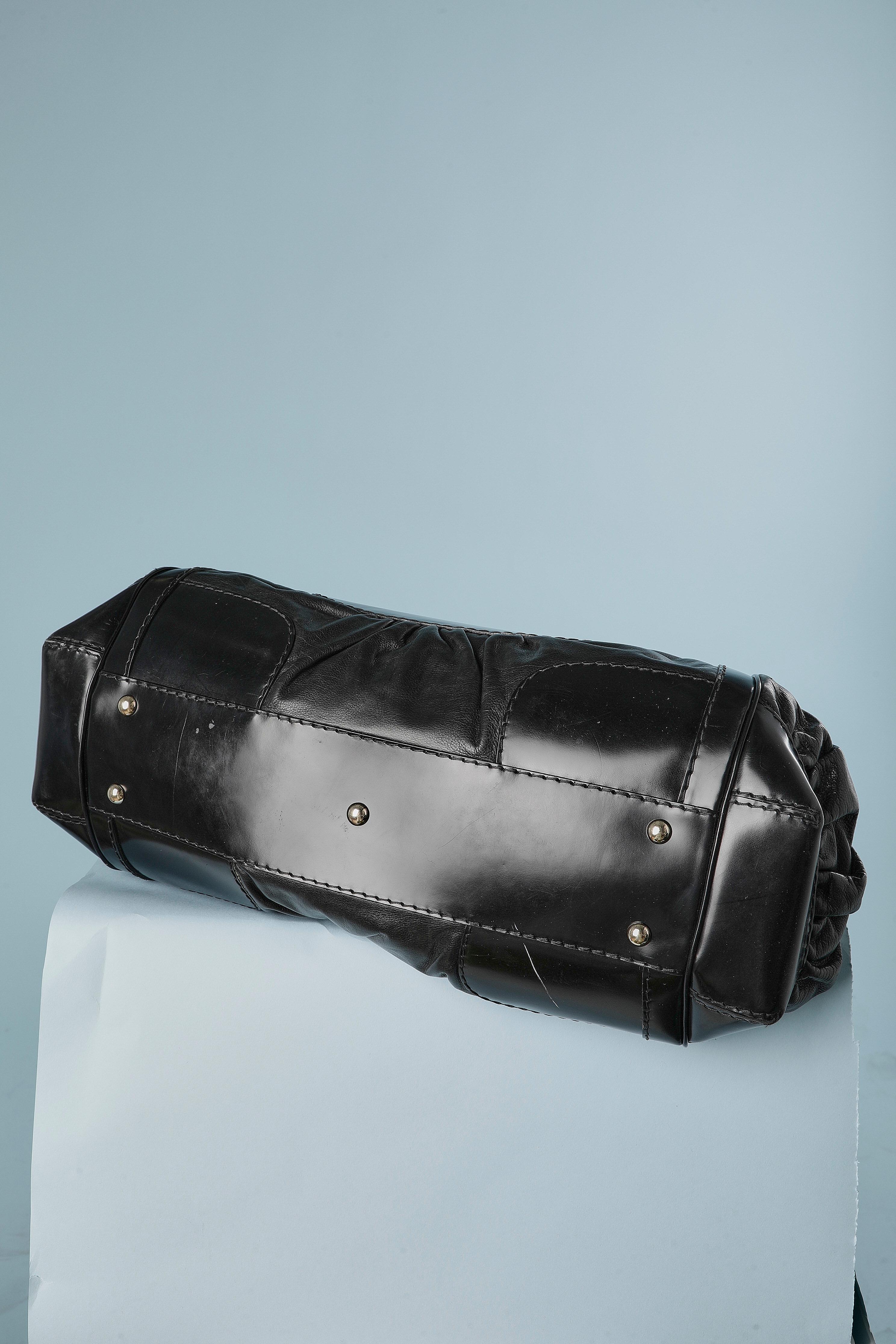 Women's Bi-leather top handle bag with silver metal buckle on the front GUCCI For Sale