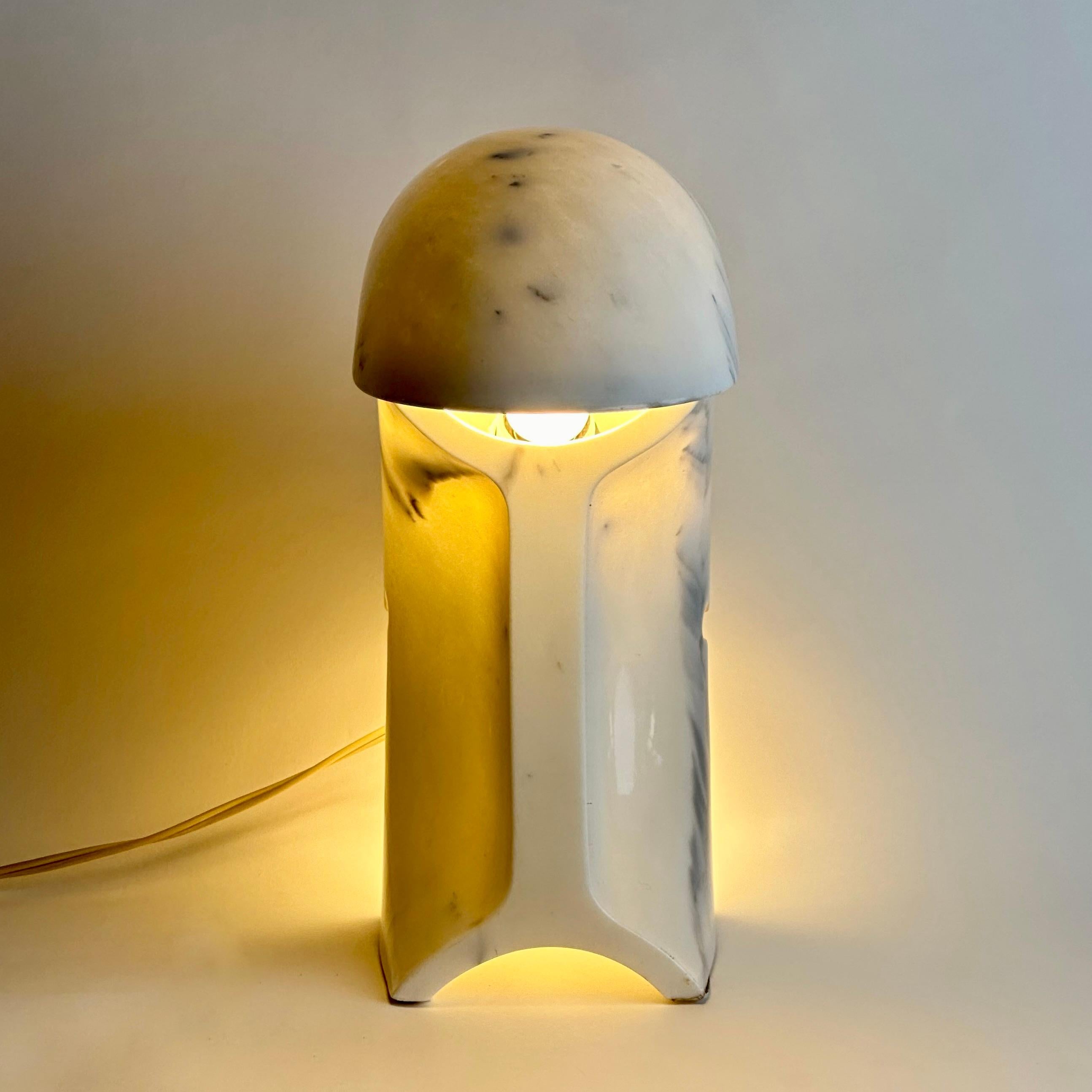 Biagio. Designed by Tobia Scarpa, 1968 (among the first pieces made still with lead marble polishing technique and a gorgeous patina).
Table lamp providing direct light. Lamp body carved from a single block of Carrara marble. One E27 Light Bulb