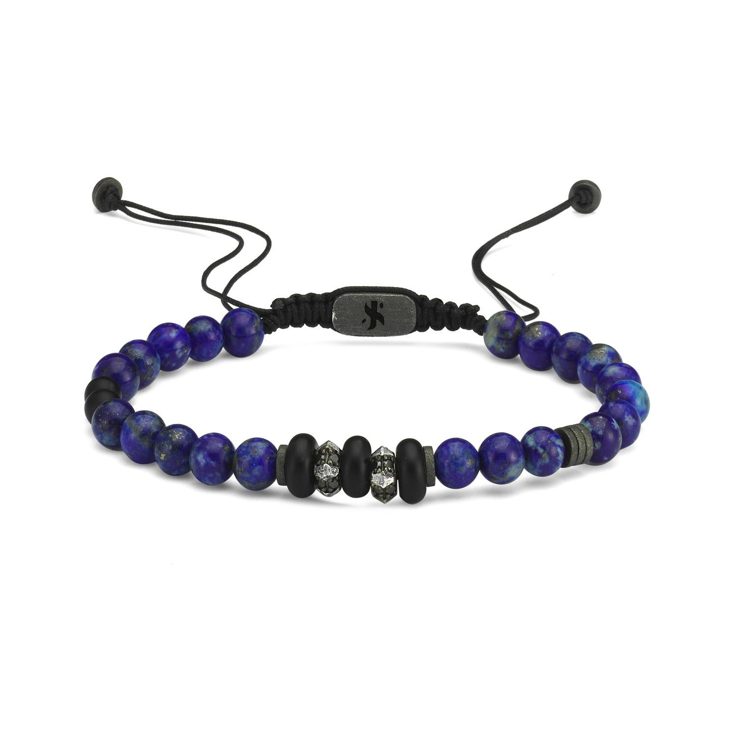 Bian bracelet in lapis & matt onyx by Selda Jewellery

Additional Information:-
Collection: Men's Luxury Bracelets

The use of lapis & matt onyx stones is combined with sterling silver charms and Black diamonds to create a sporty and stylish