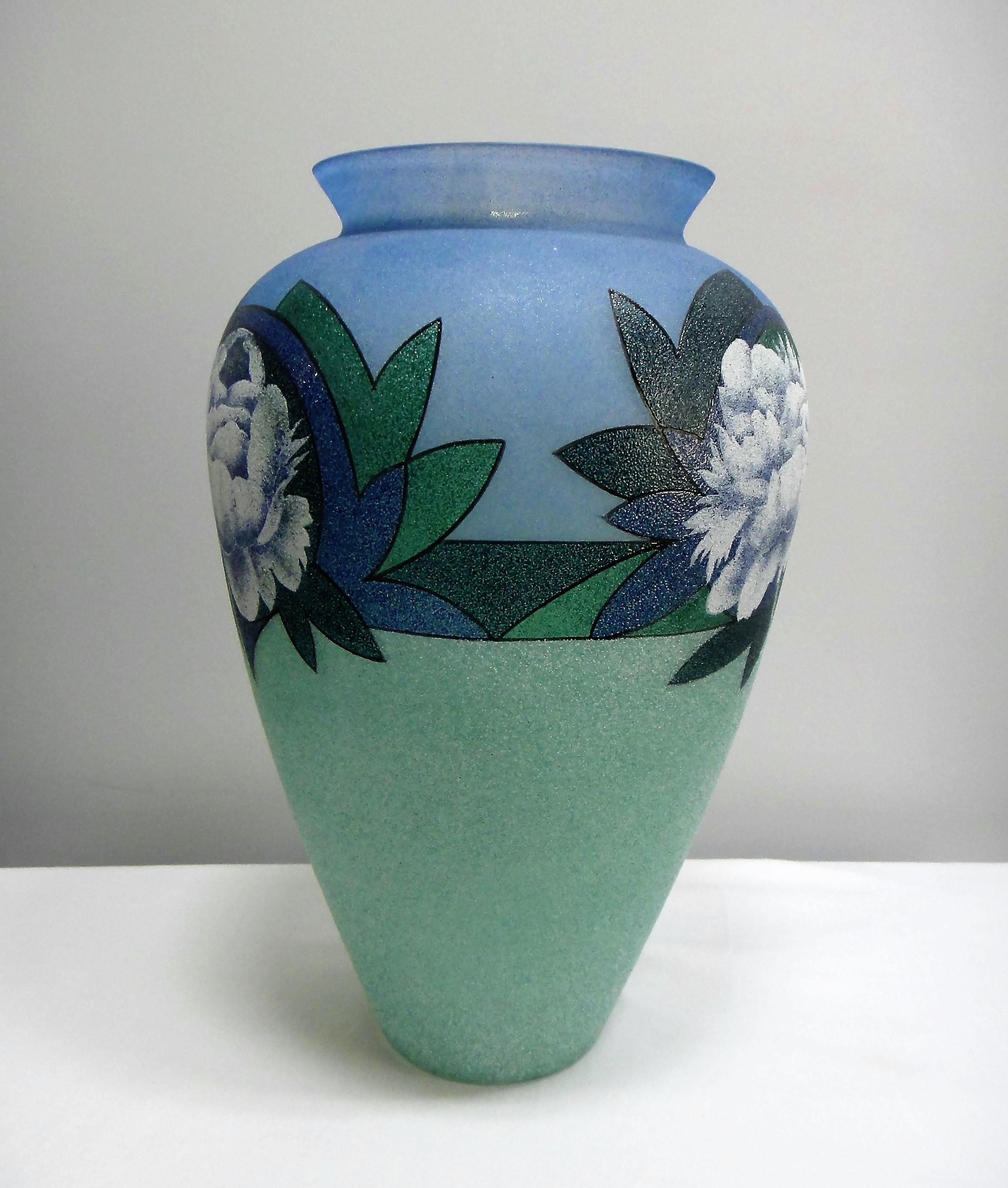 Biancalani Elio Glass Grit Vase from Florence, Italy offered for sale is a large Biancalani Elio hand blown and decorated art glass vase with a graniglia glass grit finish. The vase has a floral motif and is created in the Art Deco style.