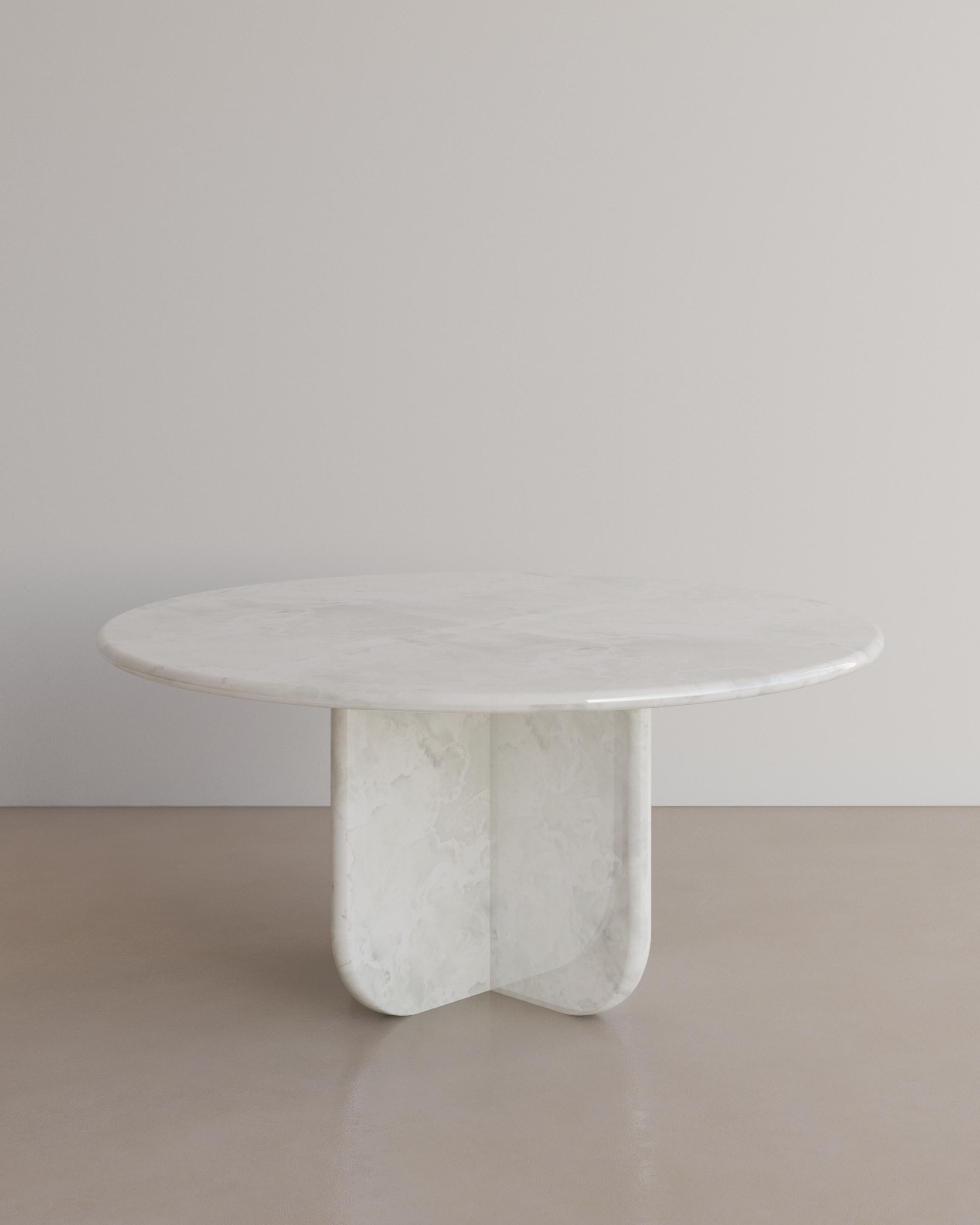 The Essentialist presents the Ètoile dining table I. A bold rounded circle effortlessly stacks upon a four point star. Smooth planes exonerate beautiful natural patterning, forging a statement of minimalism that embodies the spirit of The
