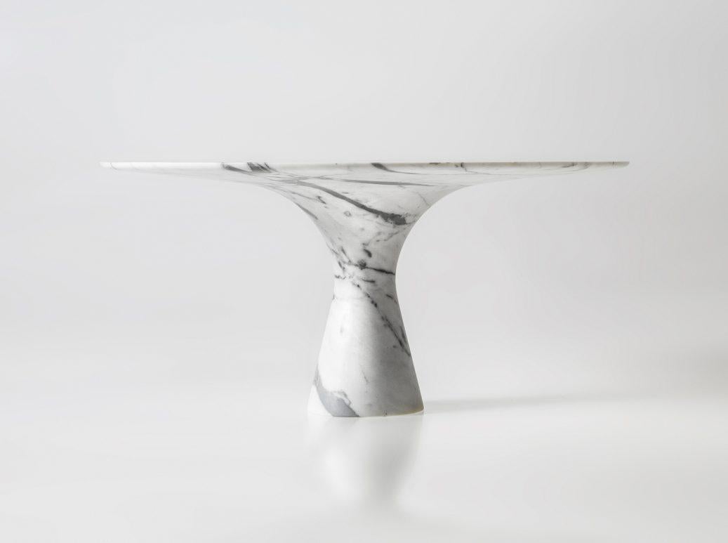 Bianco Statuarietto Refined Contemporary Marble Oval Table 210/75
Dimensions: 210 x 135 x 75 cm
Materials: Bianco Statuarietto marble.

Angelo is the essence of a round table in natural stone, a sculptural shape in robust material with elegant lines