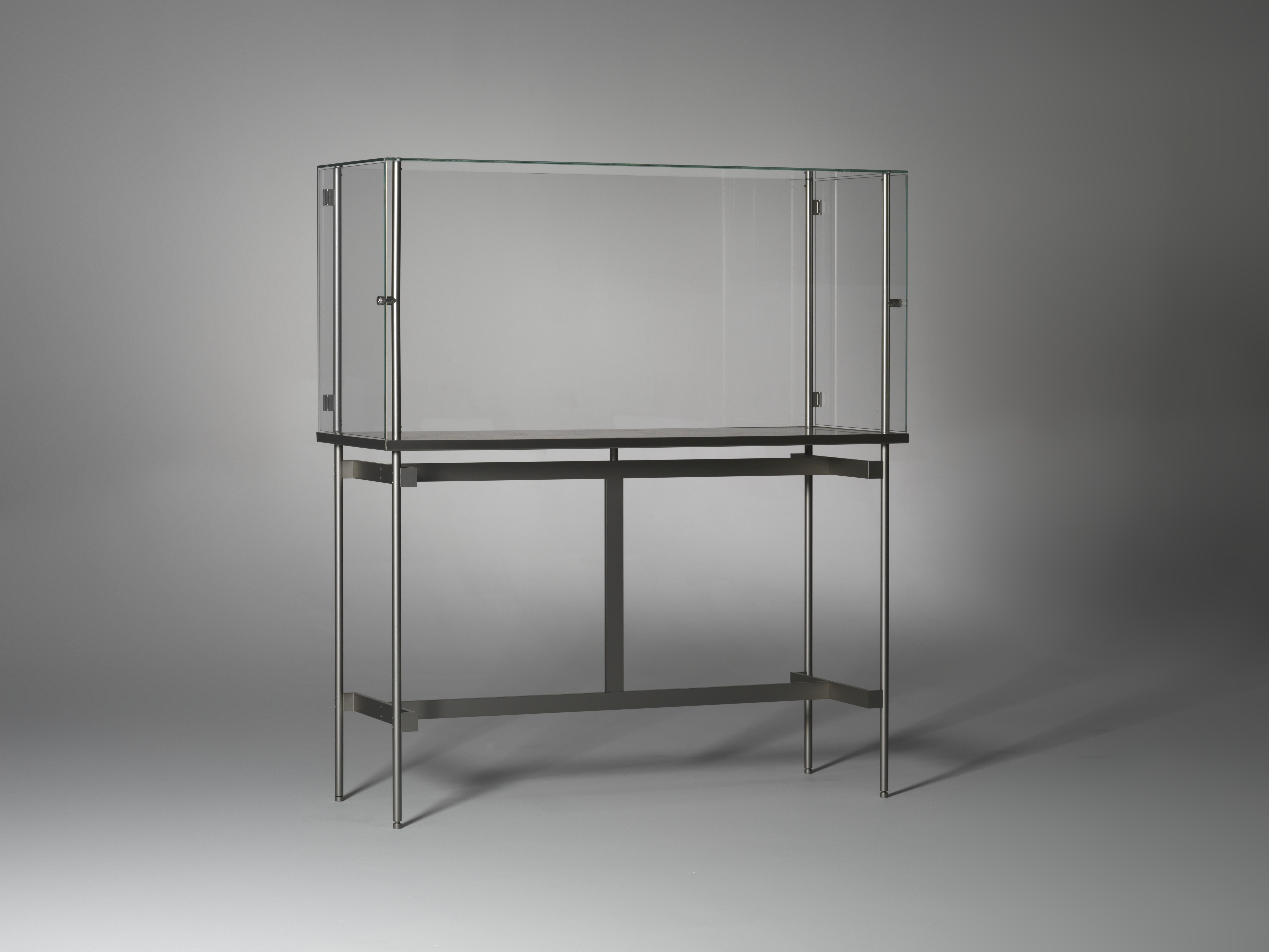Bianco Statuarietto Visibile M Horizontal Display Cabinet by Angelo Alinea
Dimensions: W 120 x D 45 x H 125 cm 
Material: Display cabinet with marble bottom (honed). Frame in metal, lacquered. Glass cabinet in float glass 6 mm, door in float glass 4