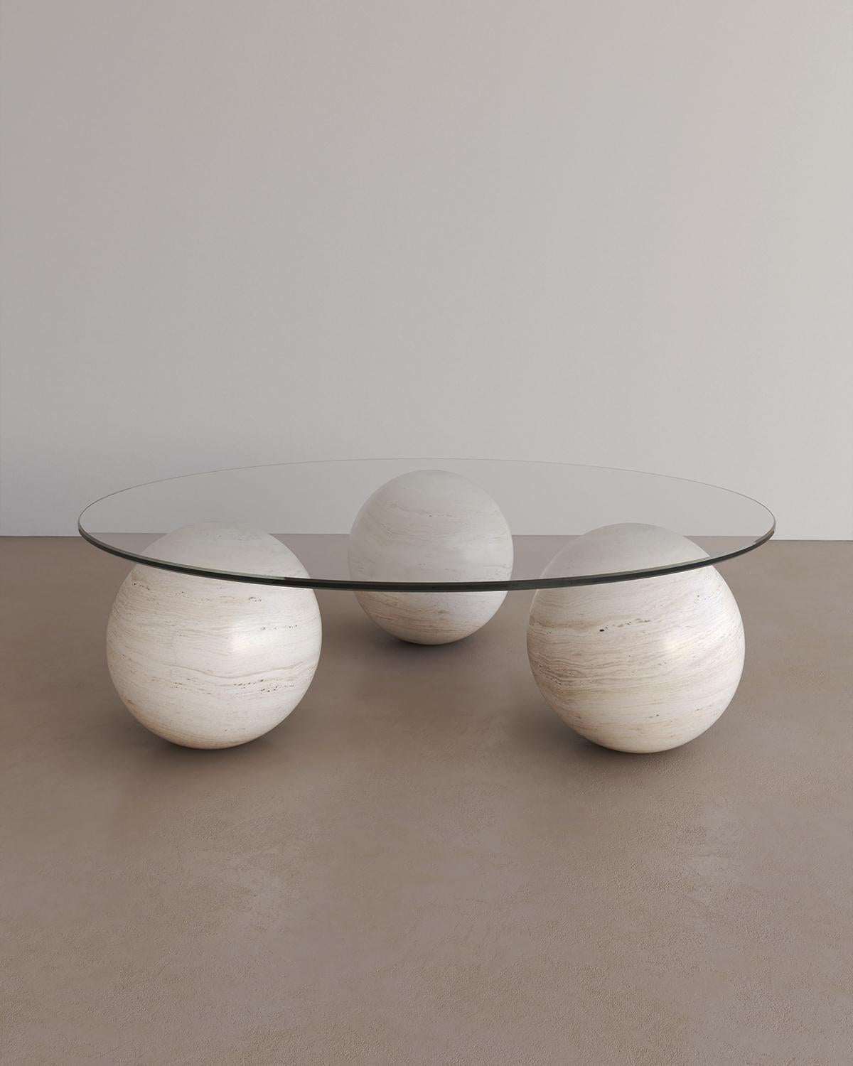 The Sufi coffee table I by The Essentialist celebrates proportion, scale and ancestral power. Filling the room with metaphors of ocean and fragments of sun. This monolithic coffee table embodies the three pillars of the earth intricately bound by