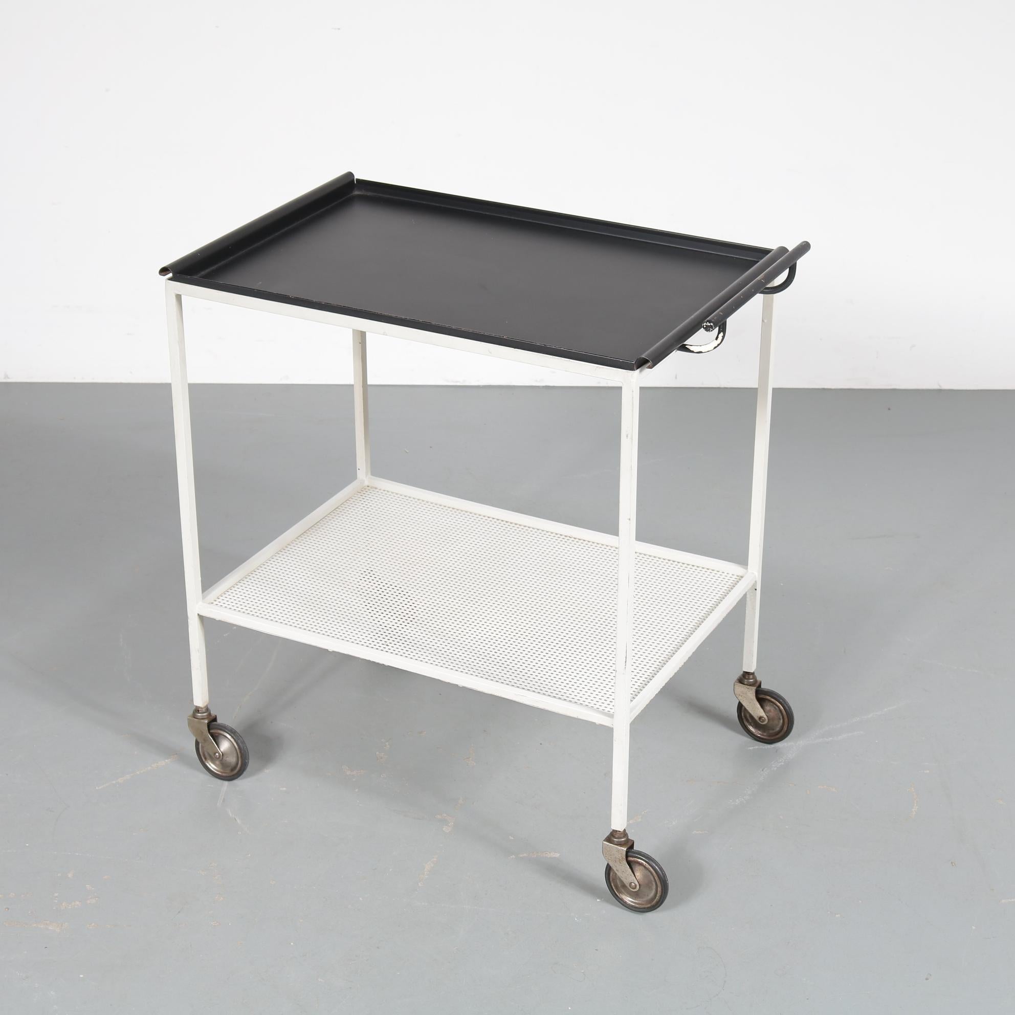 A beautiful metal trolley by French designer Mathieu Matégot, manufactured by Artimeta in the Netherlands in 1957.

This highly recognizable model is named 