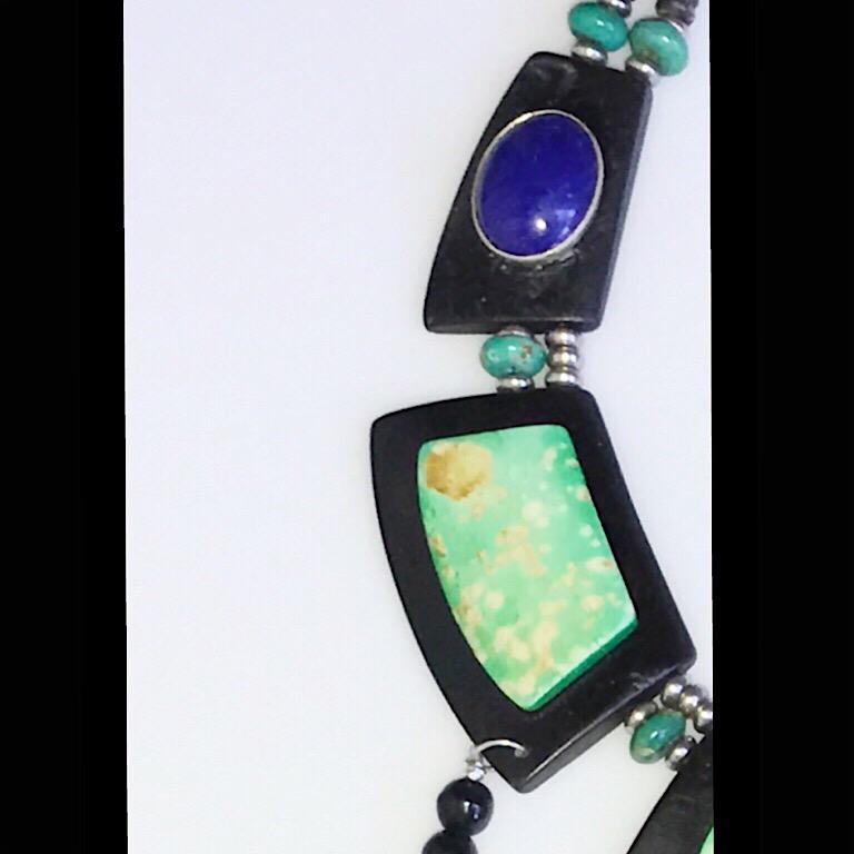 Modern Exolette Bib Necklace with Green Jade Hardwood Onyx Lapis Silver and Red Coral For Sale