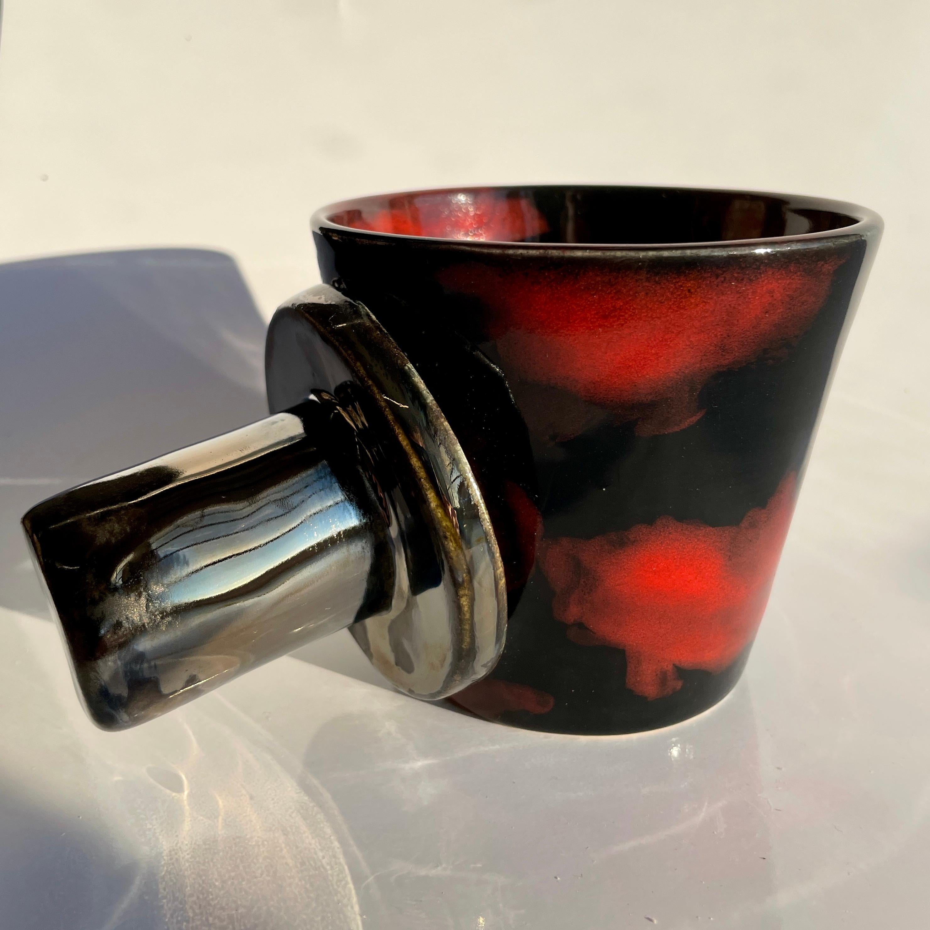 The BIB V, shown here in Diffused China Red/Raven and Broken Silver, the food safe vessel for your favorite beverage of choice, entertaining, or as a decorative object or object d'art. Versatile, sustainable and one of kind, made of recycled