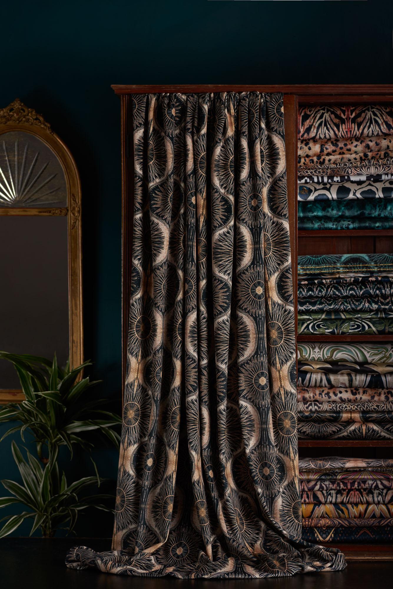 This is our most popular design – a lino print transformed into a flowing pattern in black and soft gold tones. The metallic element of the original print transfers well on to this velvet giving a soft sheen.

This velvet has a very different handle