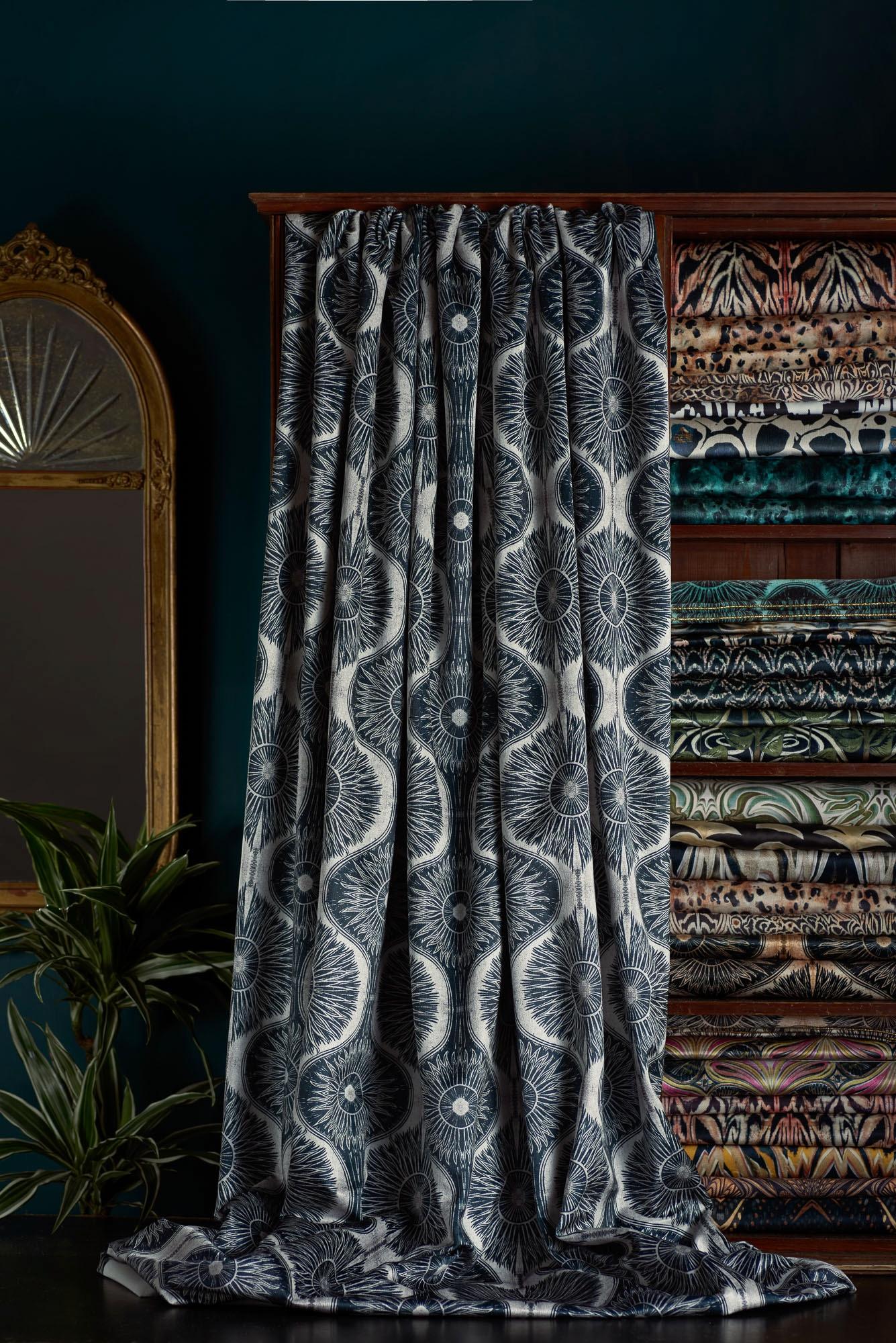 This is our most popular design – a linoprint transformed into a flowing pattern in pewter and black tones. The metallic element of the original print transfers well on to this velvet giving a soft sheen.

This velvet is midweight, with a strong