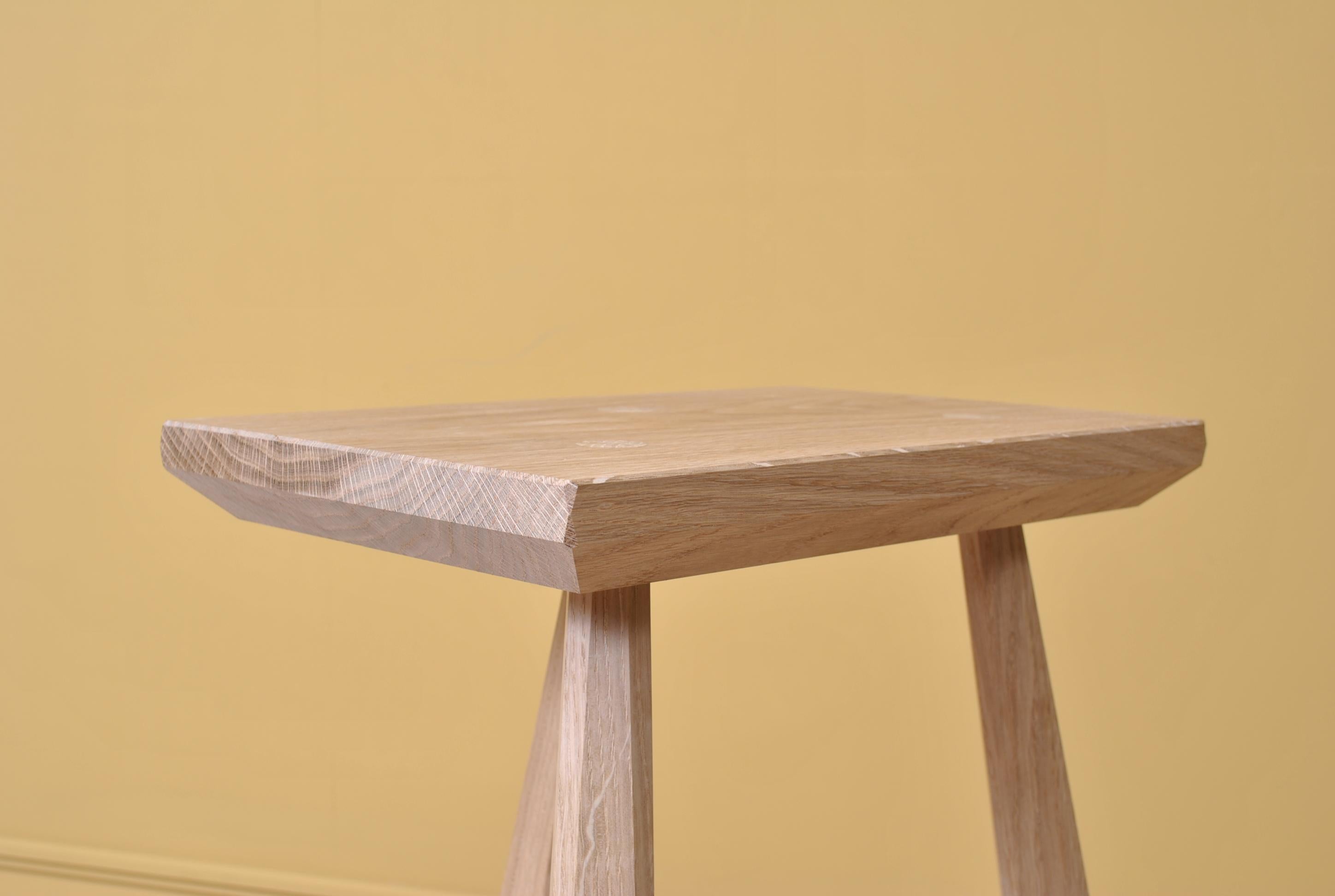 A handmade traditional staked legged milking stool by London duo Bibbings & Hensby. This example is in raw oak but other timbers and finishes are available.
Much of Bibbings & Hensby’s work is characterized by their predominant use of hand tools.