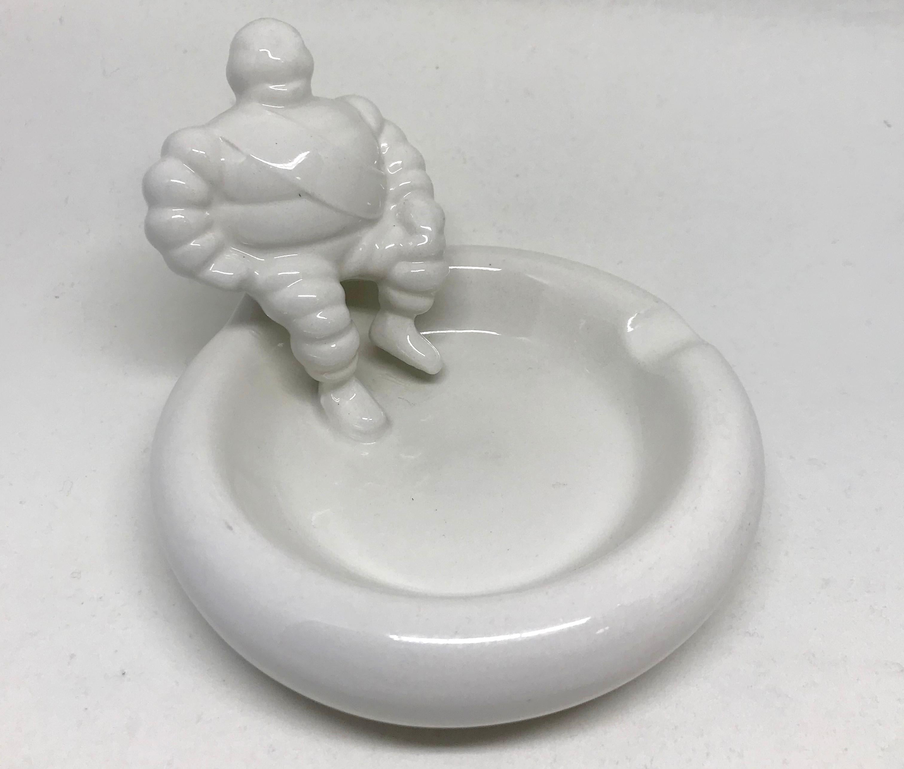 Bibendum Michelin man ashtray. Charming vintage white ceramic personal ashtray / soap dish, England, 20th century. 
Dimensions: 4.75