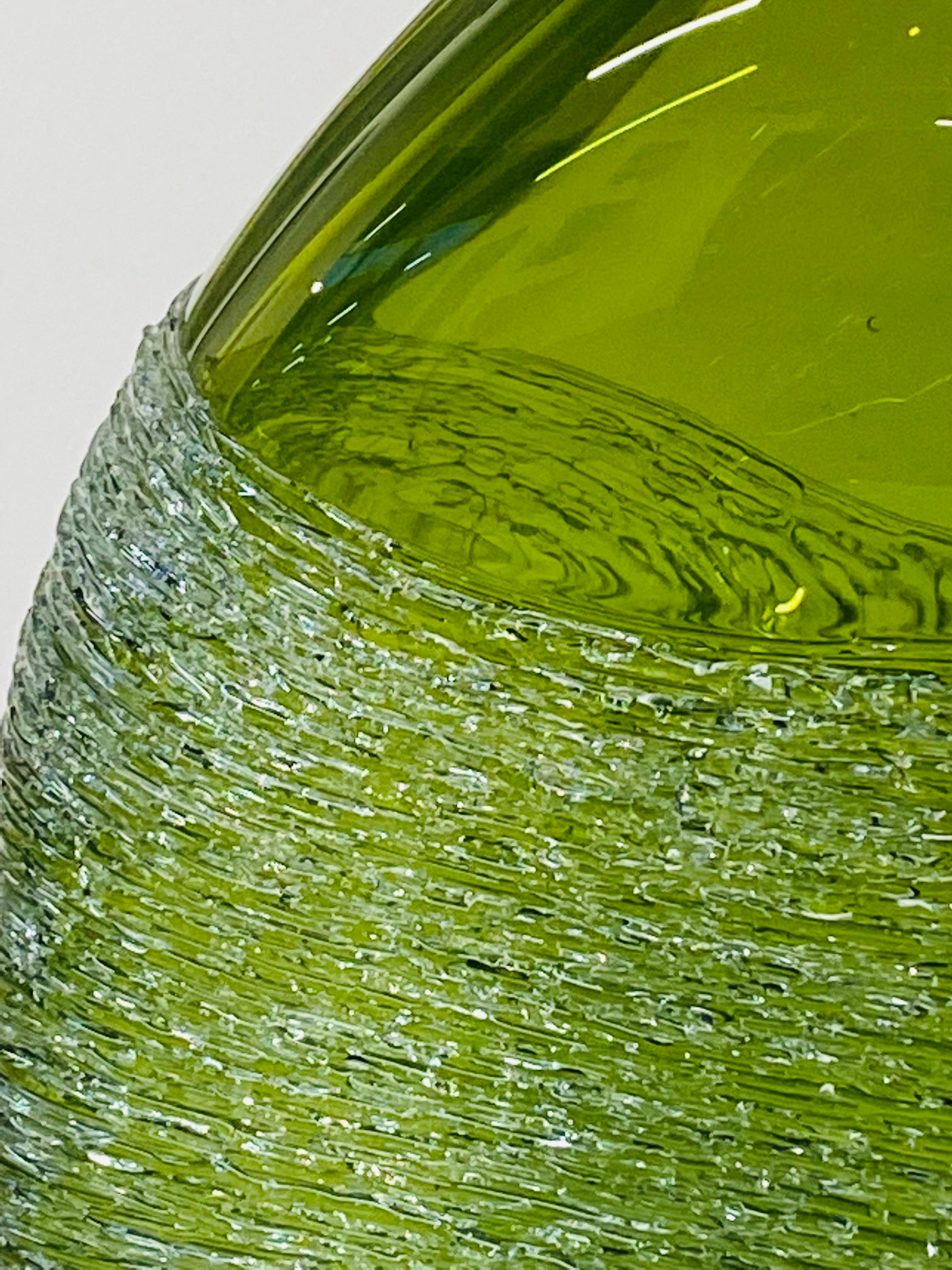 Bibi Smit
Luminous Fruit, green
H30cm-30cm-D12cm 
Blown glass

Bibi Smit (b. 1965) lives and works in the Netherlands. She is a glass artist and designer. She feels the need to control all the processes, from the idea and the design to the blowing,