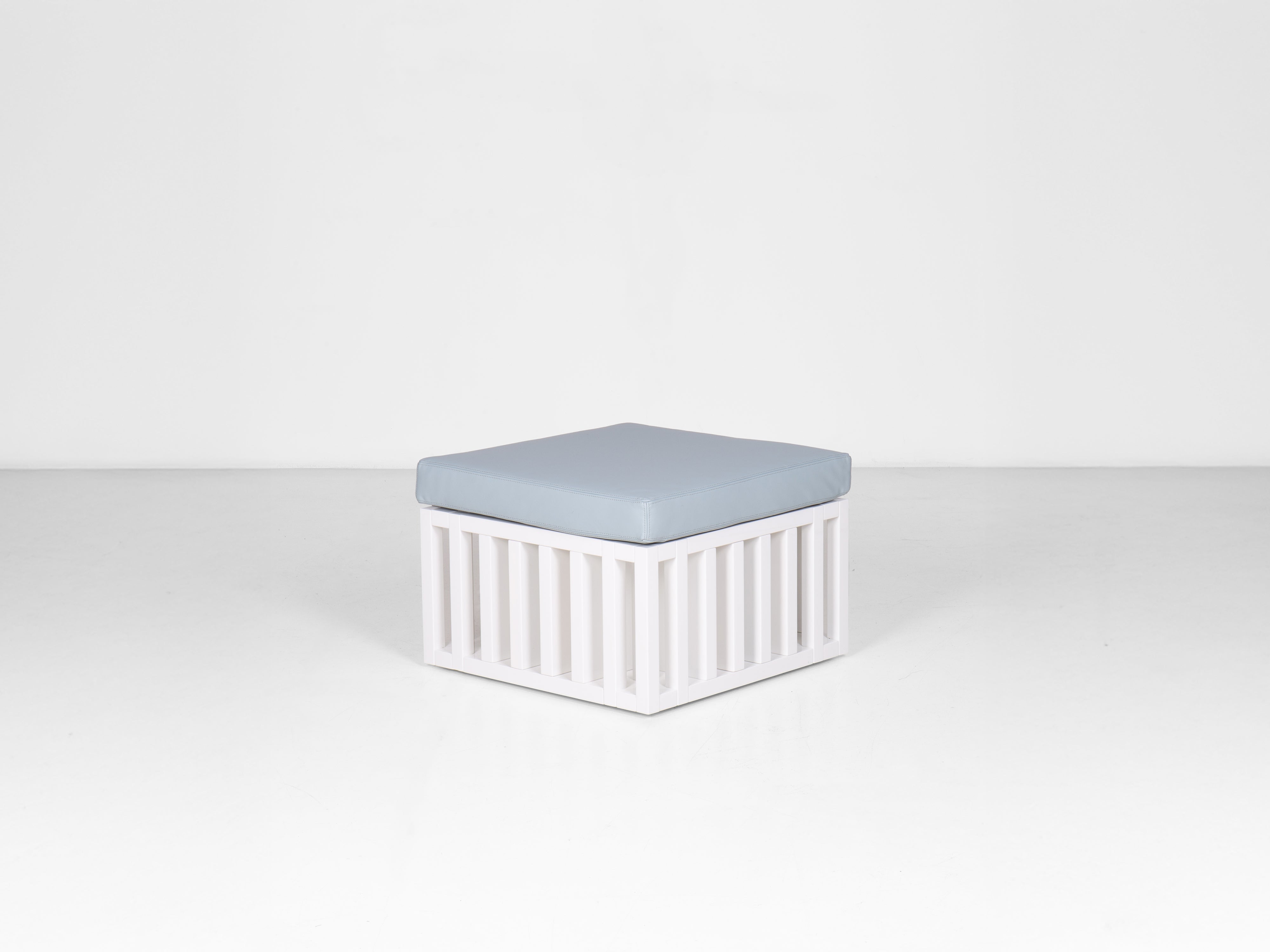 Bibliopouf, a footstool-bookcase by designer Giovanni Gennari.

Materials: glossy lacquered wood, polyurethane foam padding, upholstery in leather available in different colors.

Originally produced by Nobody&co., Bibliopouf was first previewed