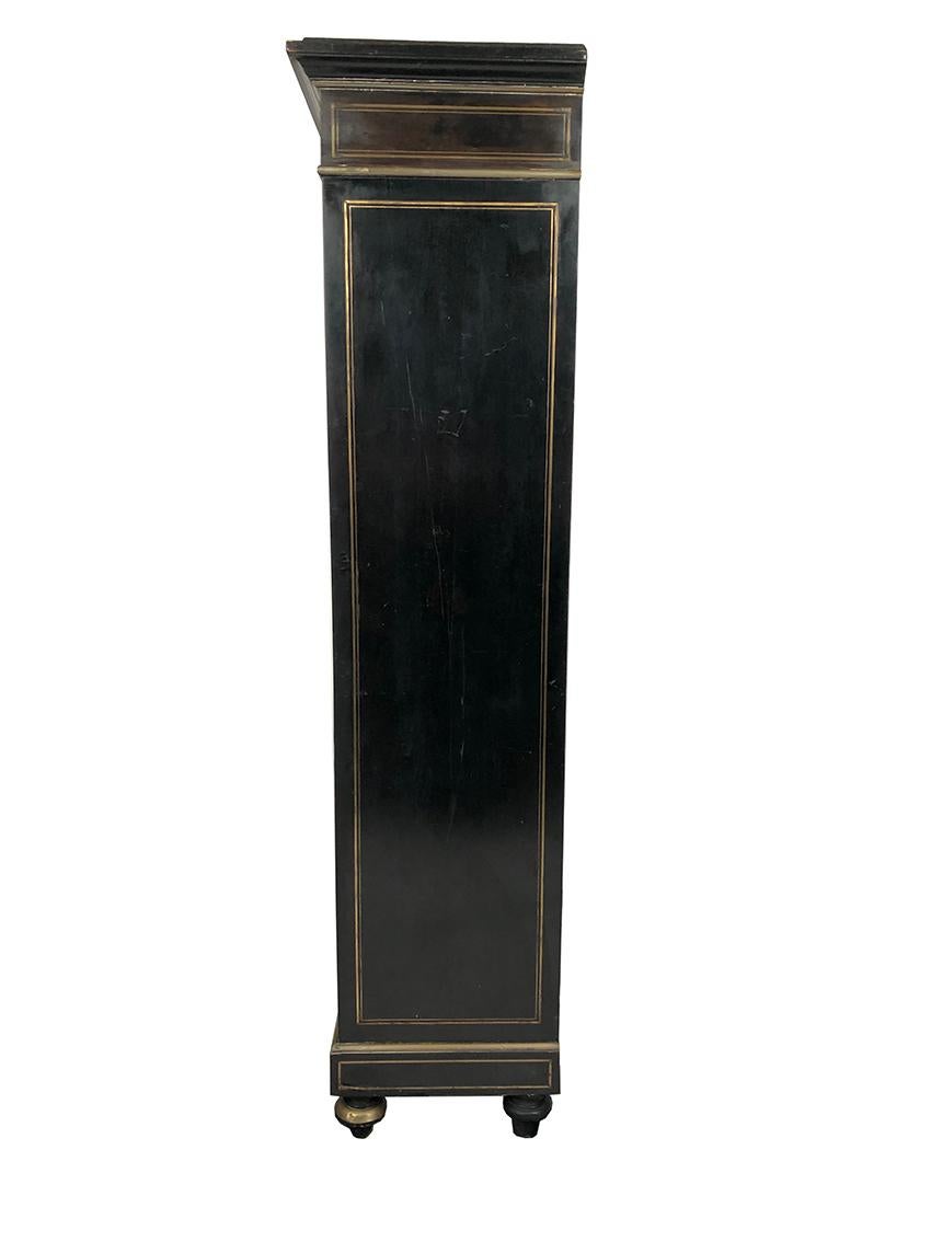 Bibliothèque Napoléon III, bois noirci marqueté de laiton, d’ivoire et de nacre For Sale 1