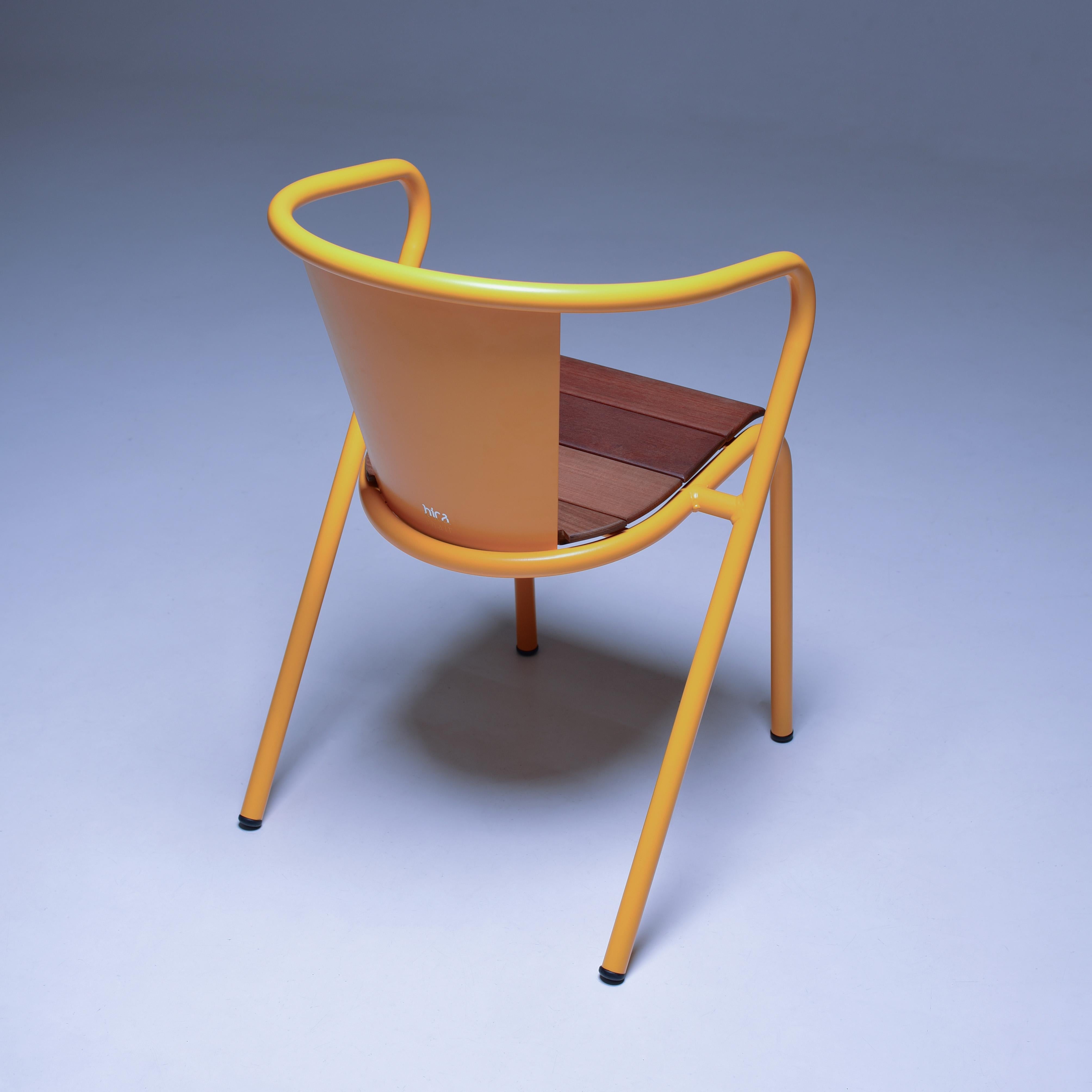 BICAchair is a sustainable stackable steel armchair made for the outdoors from recycled and recyclable steel and finished with our premium selection of powder-coating colors, in this case in a bright yellow color, that transforms a Classic in