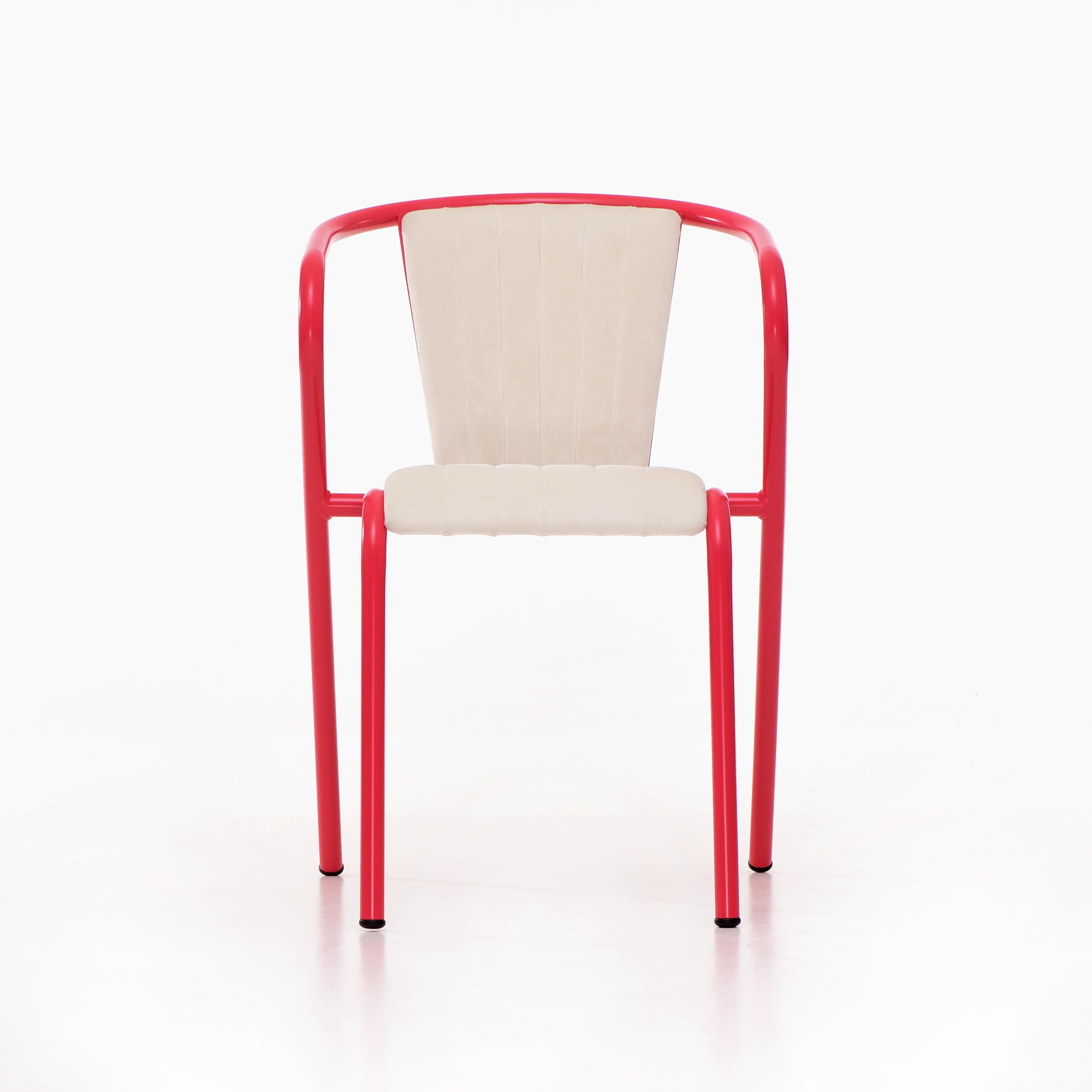 BICAchair is a stackable steel dining armchair made from recycled and recyclable steel, finished with our premium selection of powder-coating colors, in this case in bright Red-pink color, that transforms a Classic in something new and vibrant. The