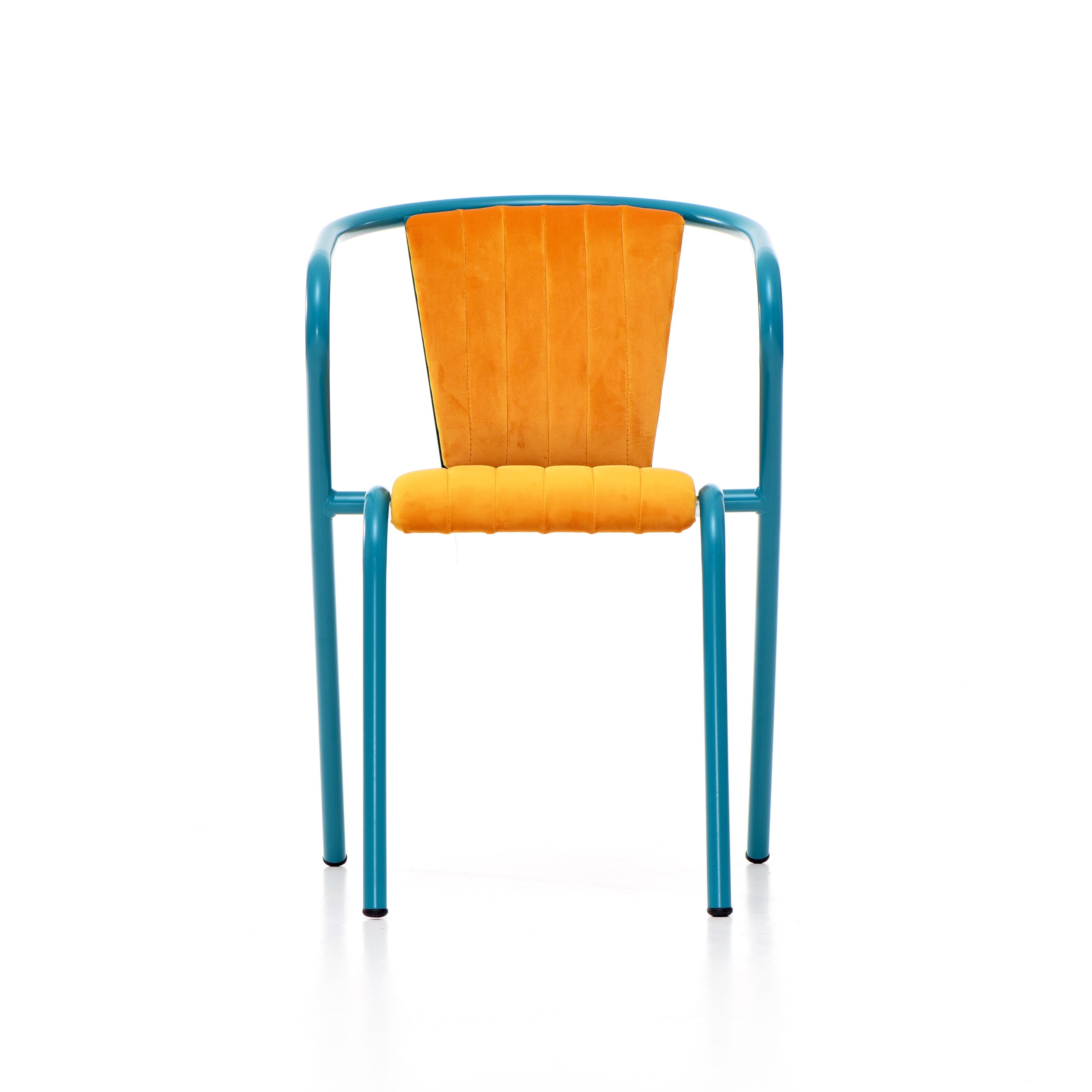 BICAchair is a stackable steel dining armchair made from recycled and recyclable steel, finished with our premium selection of powder-coating colors, in this case in rich blue color, that transforms a Classic in something new and vibrant. The