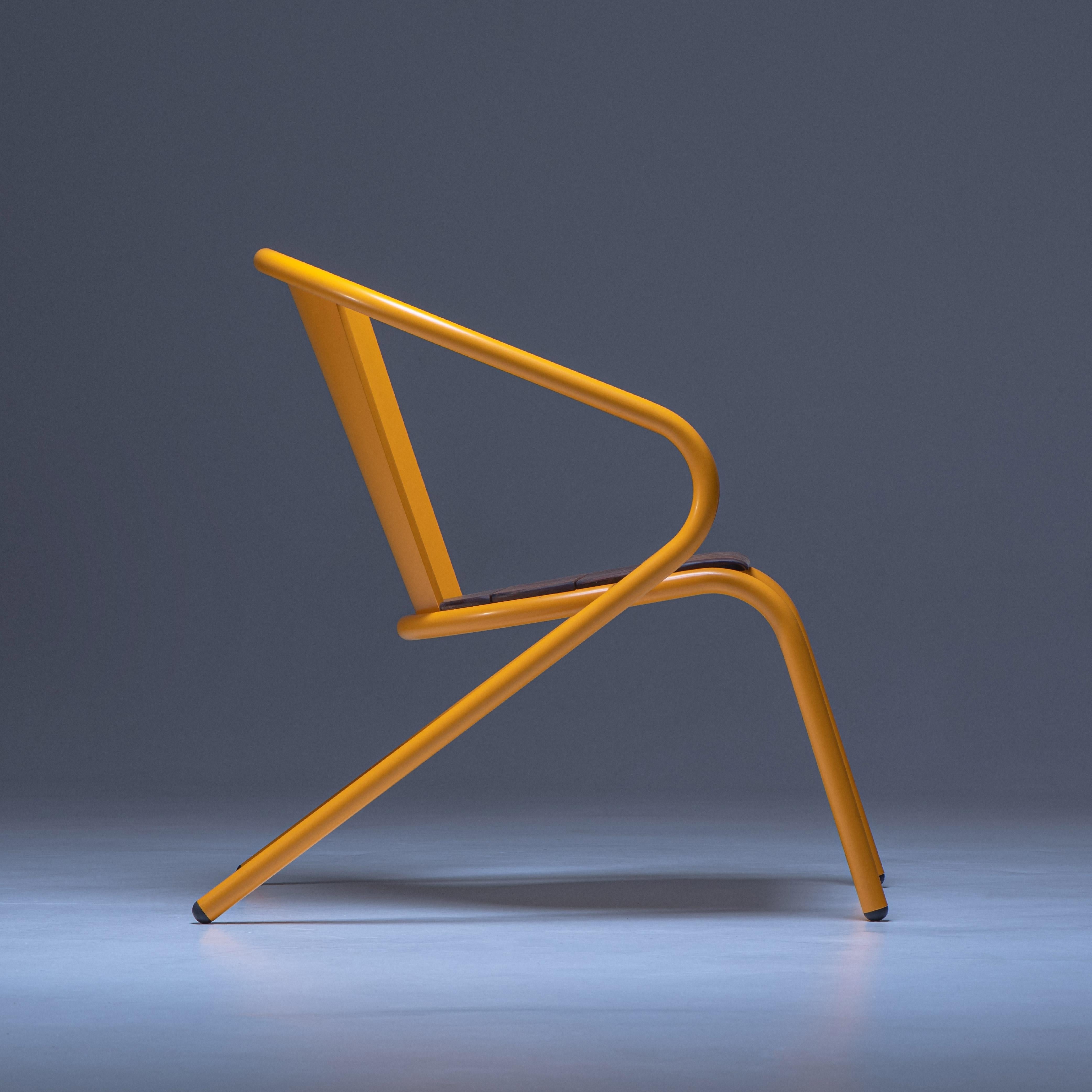 BICAlounge is a sustainable stackable steel lounge chair made for the outdoors from recycled and recyclable steel and finished with our premium selection of powder-coating colors, in this case in a bright yellow color, that transforms a Classic into