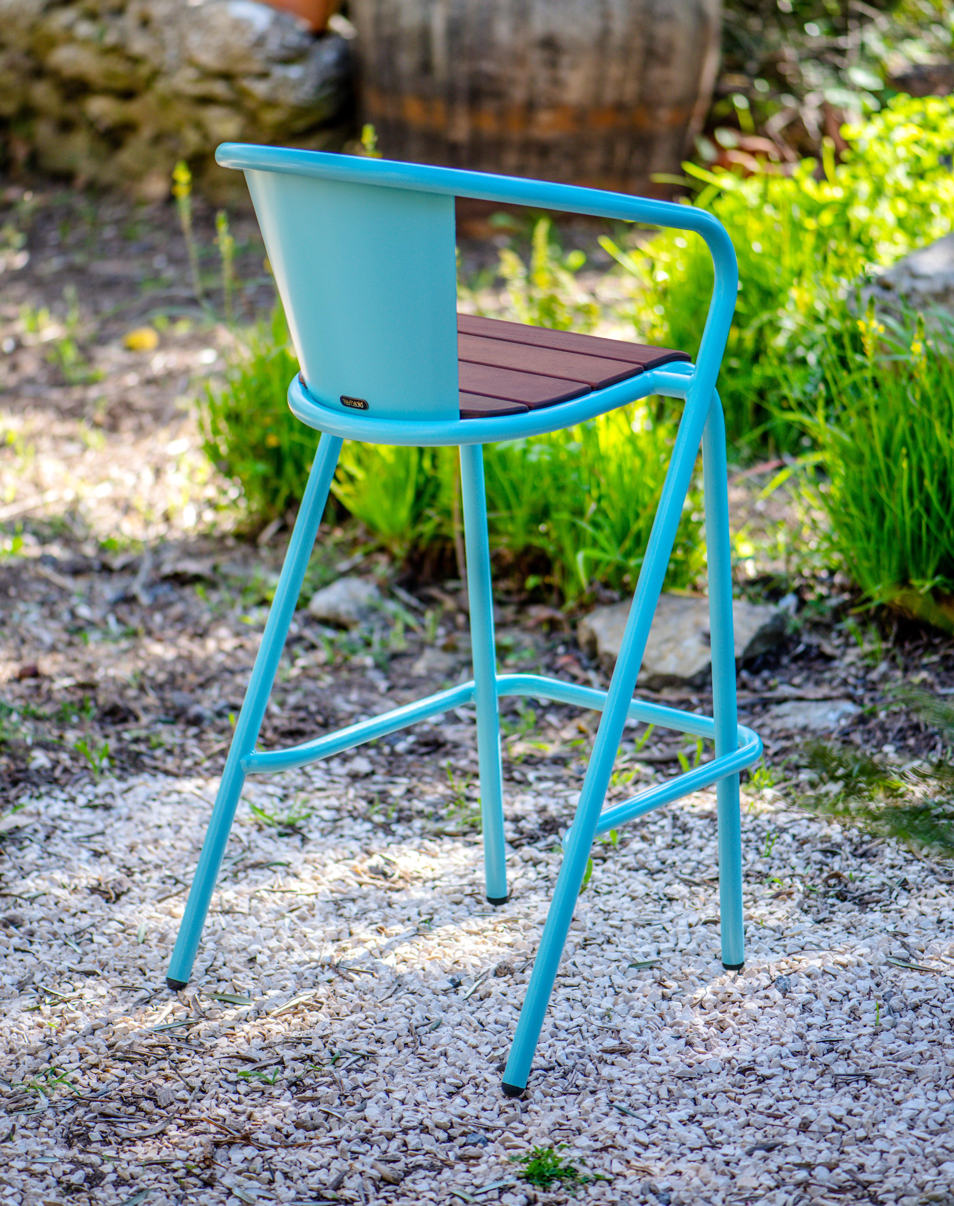 BICAstool is a sustainable stackable steel high stool chair made for the outdoors from recycled and recyclable steel and finished with our premium selection of powder-coating colors, in this case in a pastel Turquoise color, that transforms a