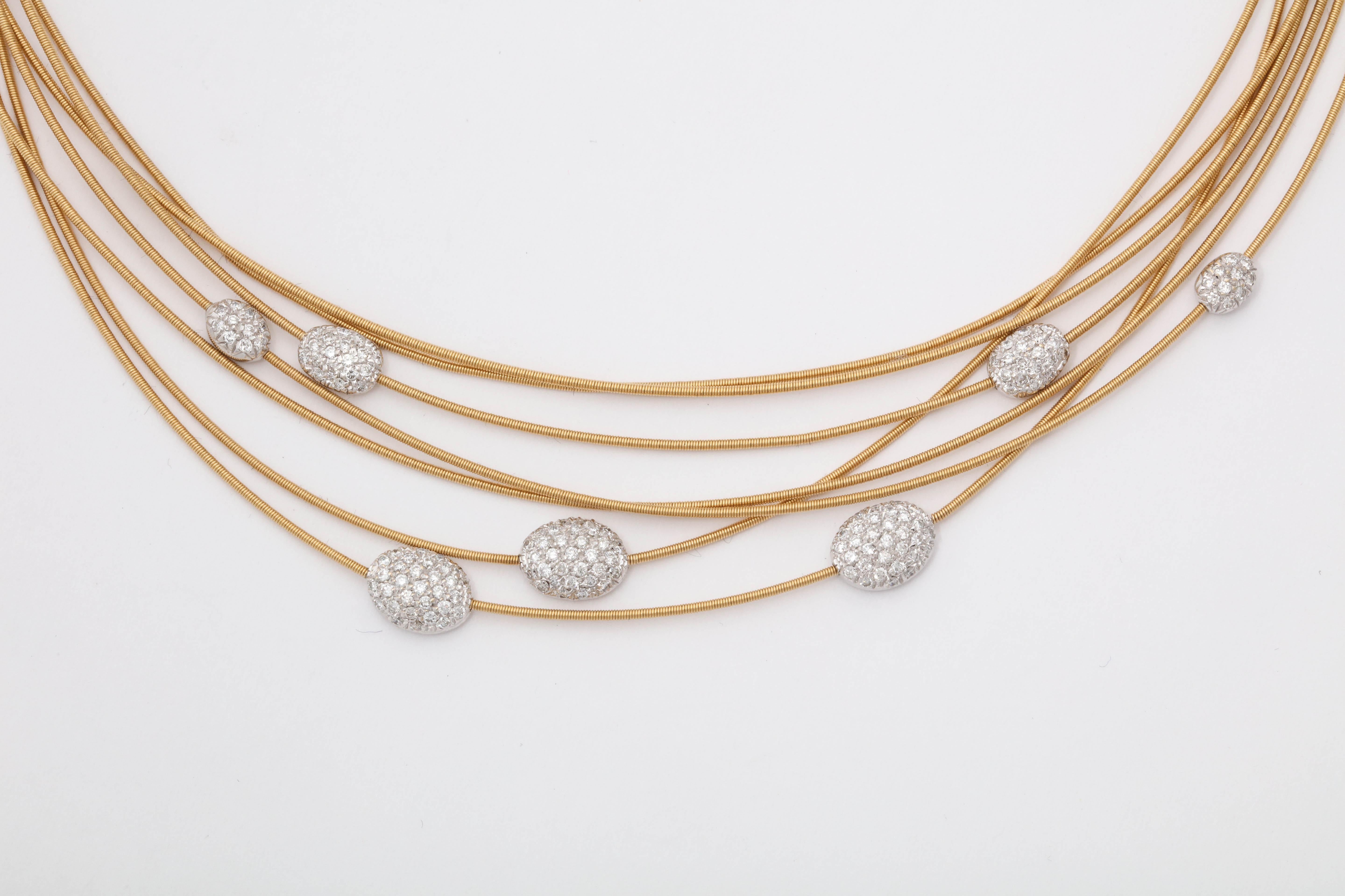 Round Cut Bicego 1990s Seven Snake Pattern Strand with Floating Diamonds Gold Necklace