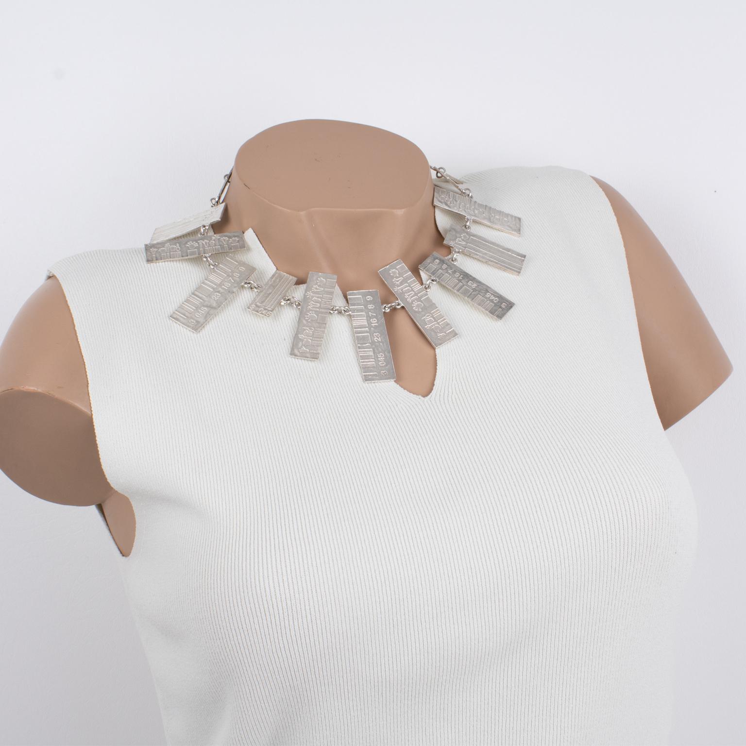 This stunning modernist silver plate link necklace by Nelly Biche de Bere, Paris, features a chunky oversized asymmetric choker with graffiti carved and hand-made feel design. The flat geometric elements have carved 