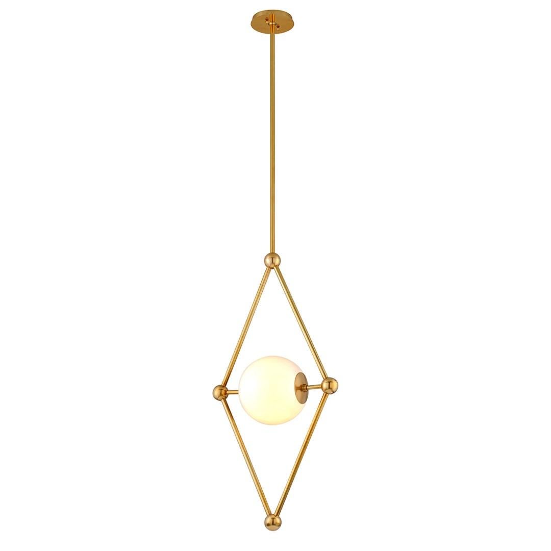 Martyn Lawrence Bullard for Corbett Lighting
The Bickley 1-Light Pendant pairs a rhomboid Solid Brass frame with a perfectly round sphere of light-diffusing White Opal Glass. 
The Vintage Brass finish and round joints soften the look of the