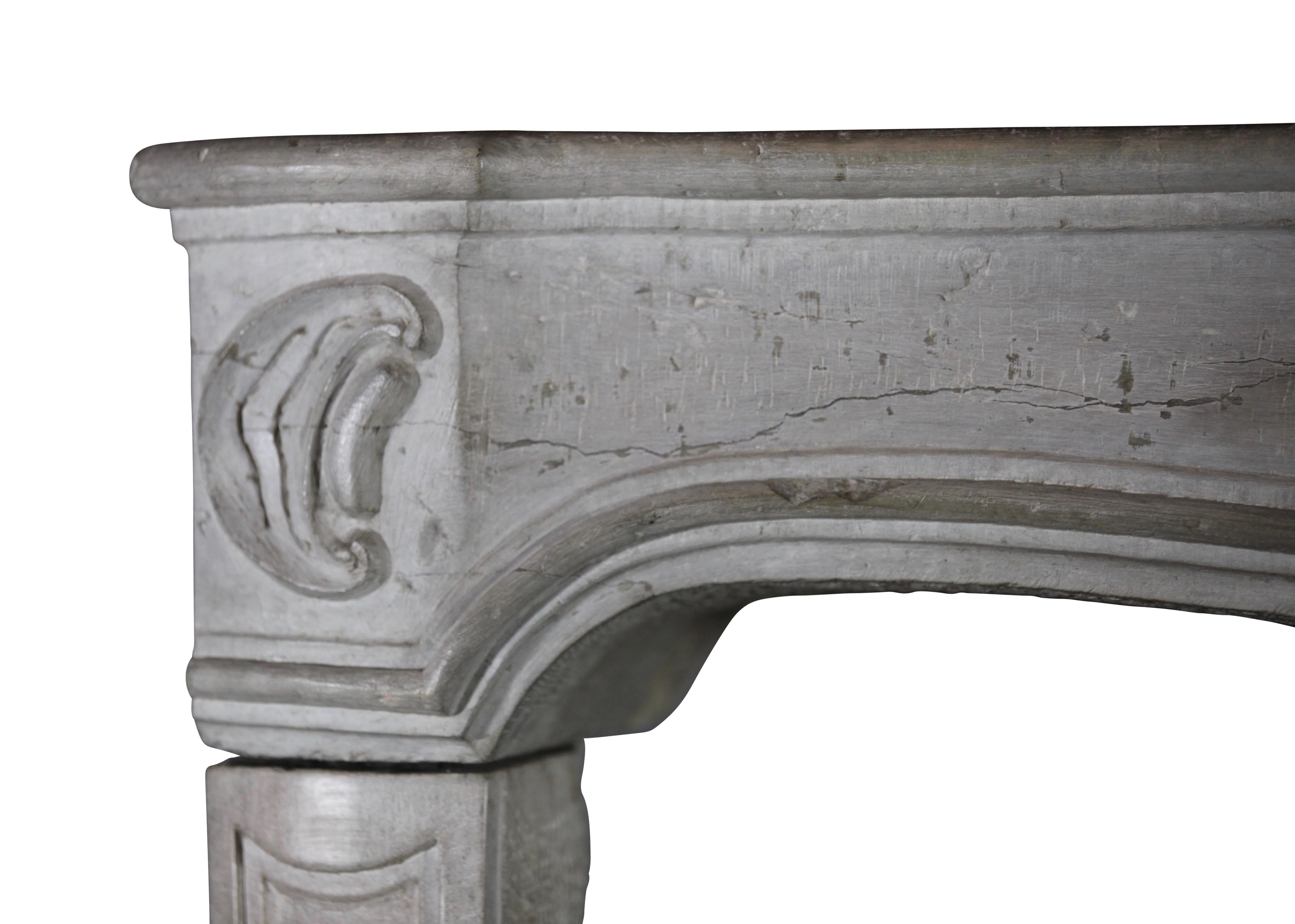 Different bicolor Louis XIV period mantel in Burgundy hard stone. Interesting is the different color, shades in the mantel. The shelf shows the detail of the work of the maker. It origines of the 18th century and can work in a rustic chique home