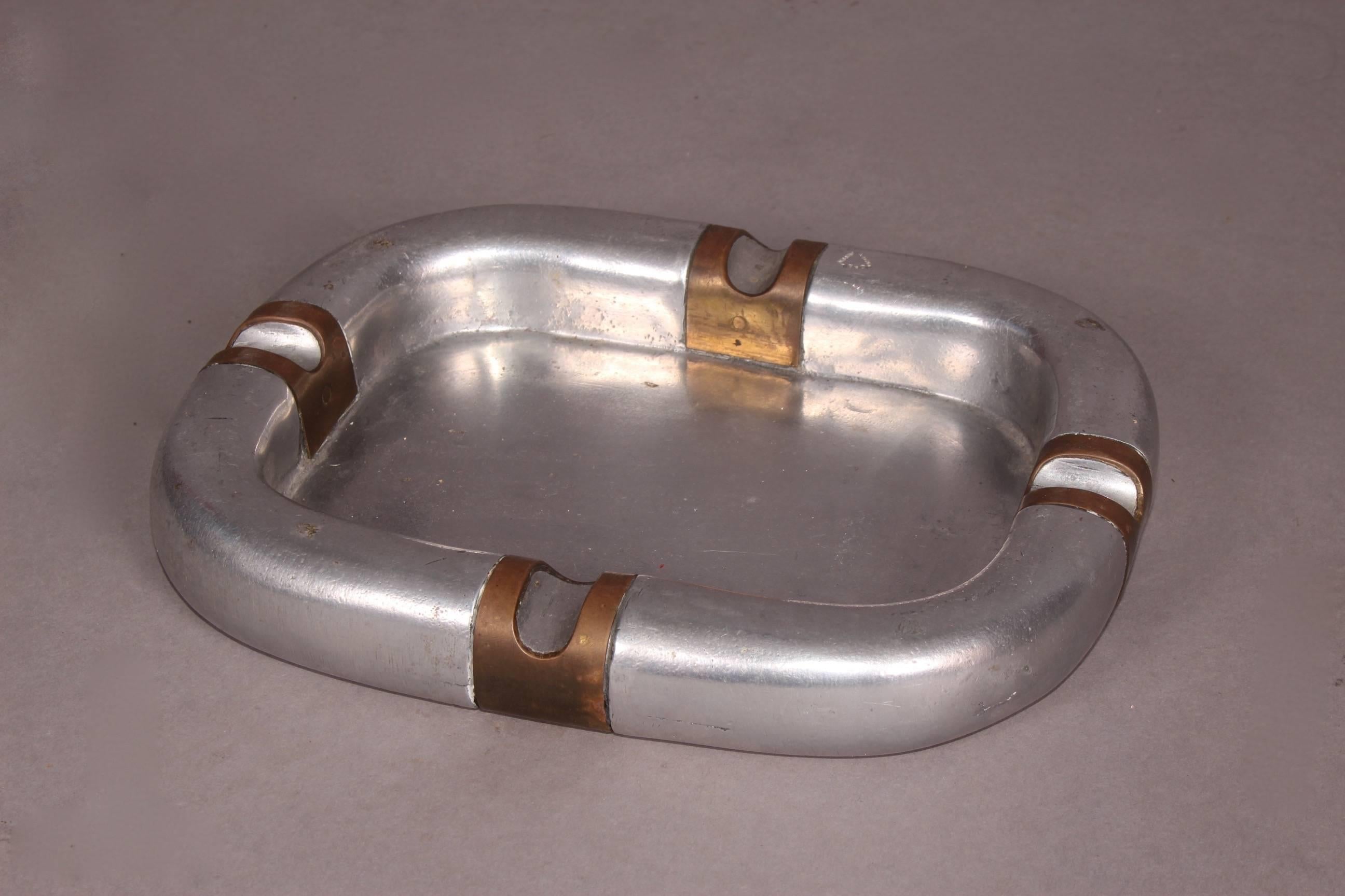 Bicolor metal ashtray.