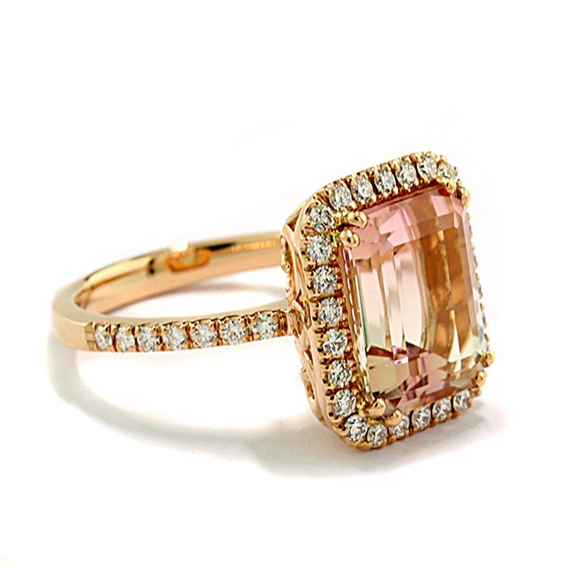 Ring with a tourmaline approx. 5.11 carats, bicolor with transitions from a bright lemon yellow to a pearly pink, octagonal cut. The bezel and ring shoulders are adorned with 40 brilliant-cut diamonds approx. 0.51 carats in total, color: Top