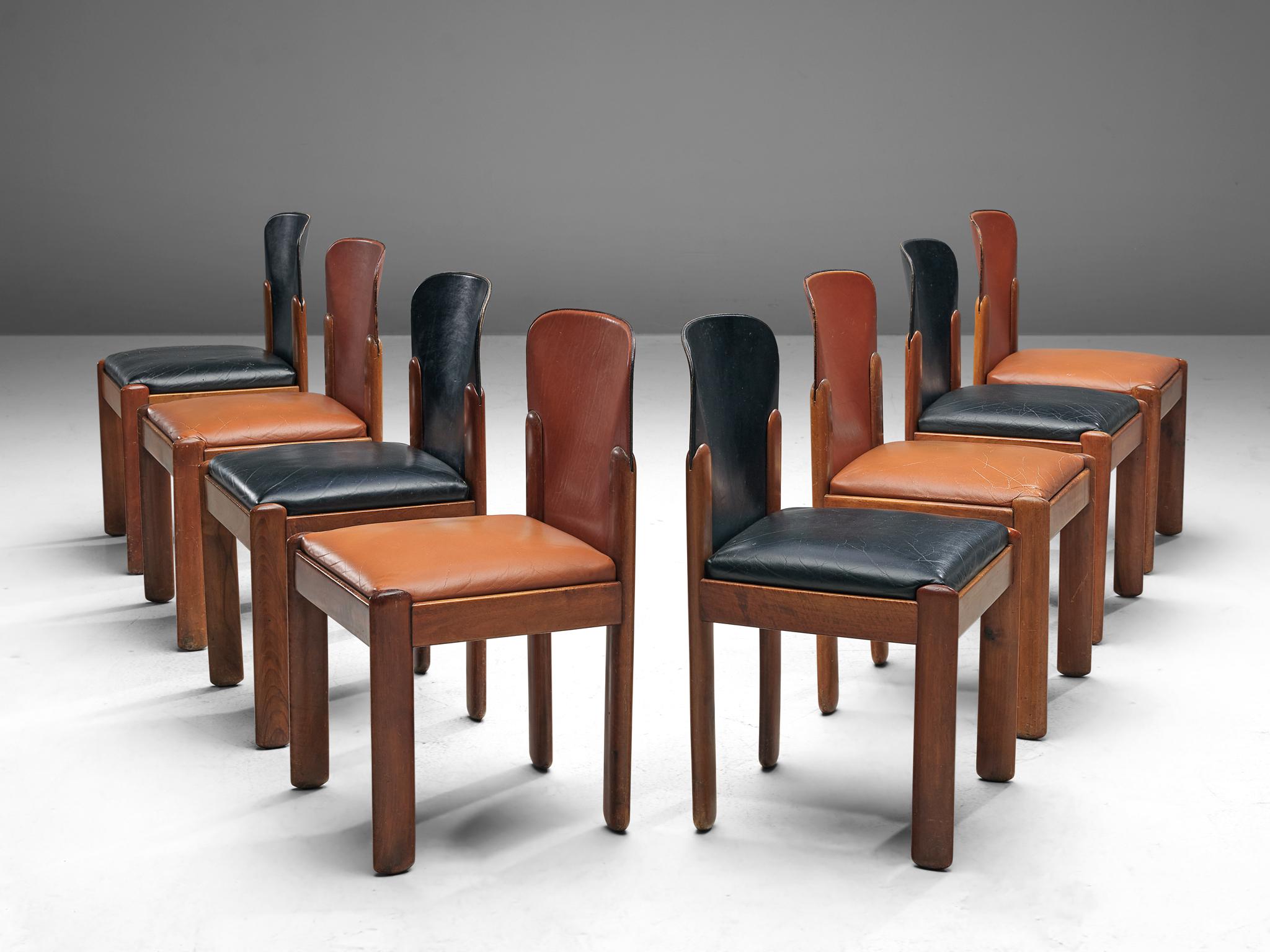 Silvio Coppola for Bernini, set of eight dining chairs model 330, leather, stained beech, Italy, 1960s.

This magnificent set of eight dining chairs by the renowned Italian designer Silvio Coppola is a remarkable display of aesthetic harmony,
