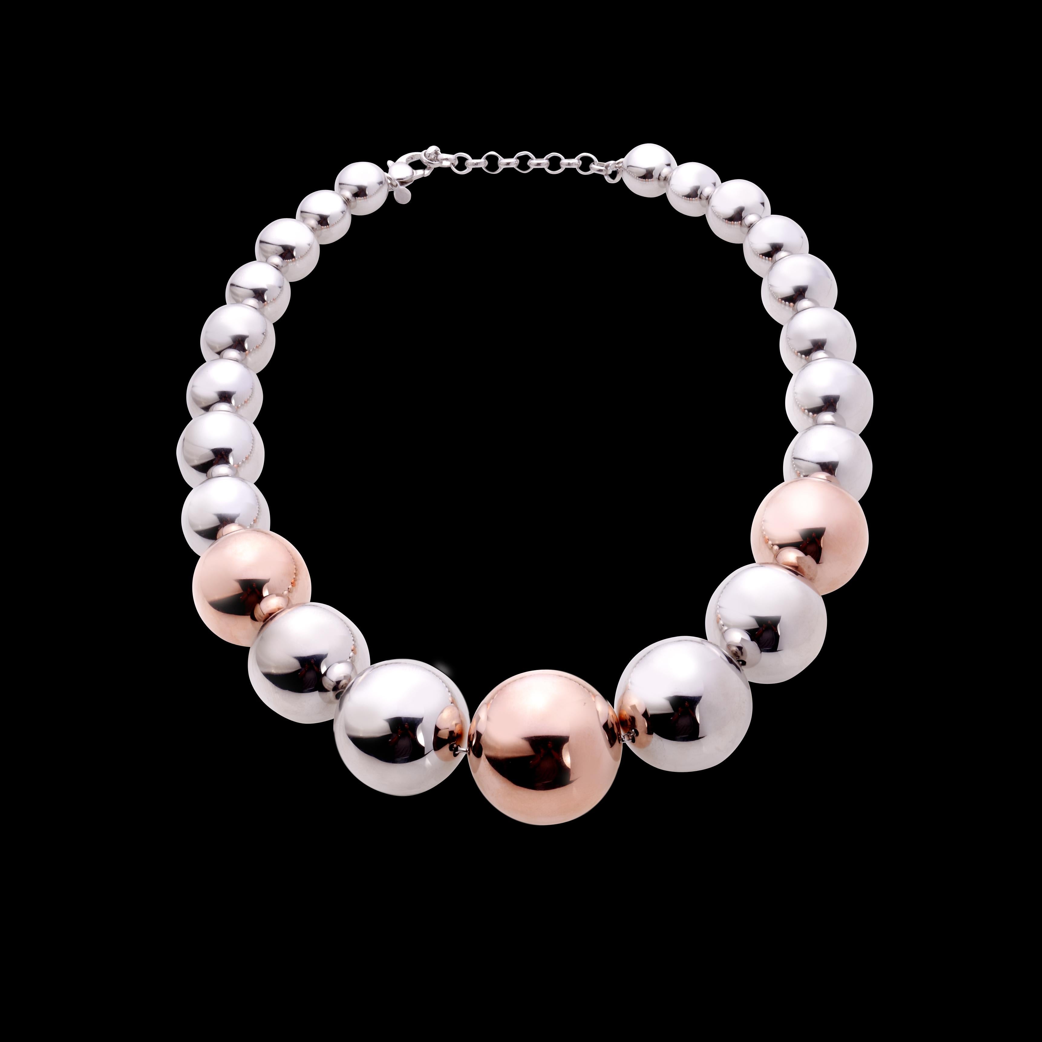 This necklace is made in sterling silver .Three of the pieces are copper-plated, creating a very special colour contrast.
This item is also available without the copper-plated silver, in all-silver.
The length is ajustable by a piece of chain that