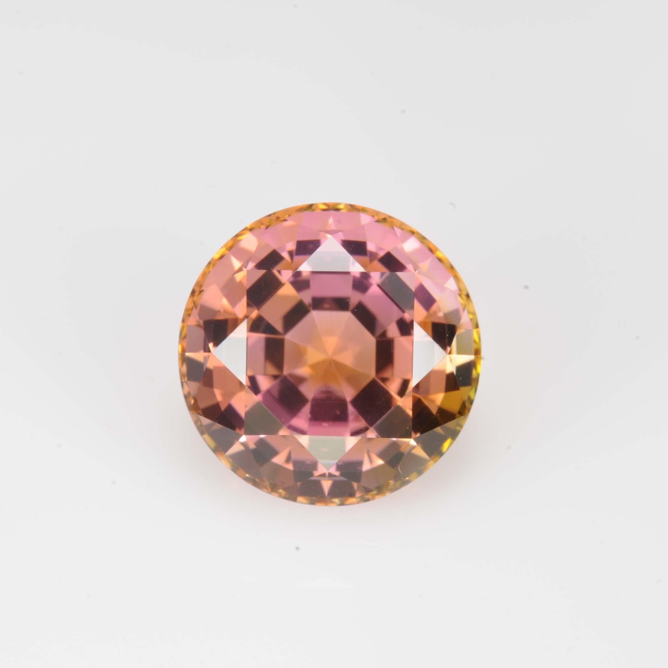 Exceptional 14.28 carat Autumn Bicolor Tourmaline round gem, offered loose to someone special.
Returns are accepted and paid by us within 7 days of delivery.
We offer supreme custom jewelry work upon request. Please contact us for more details.
For