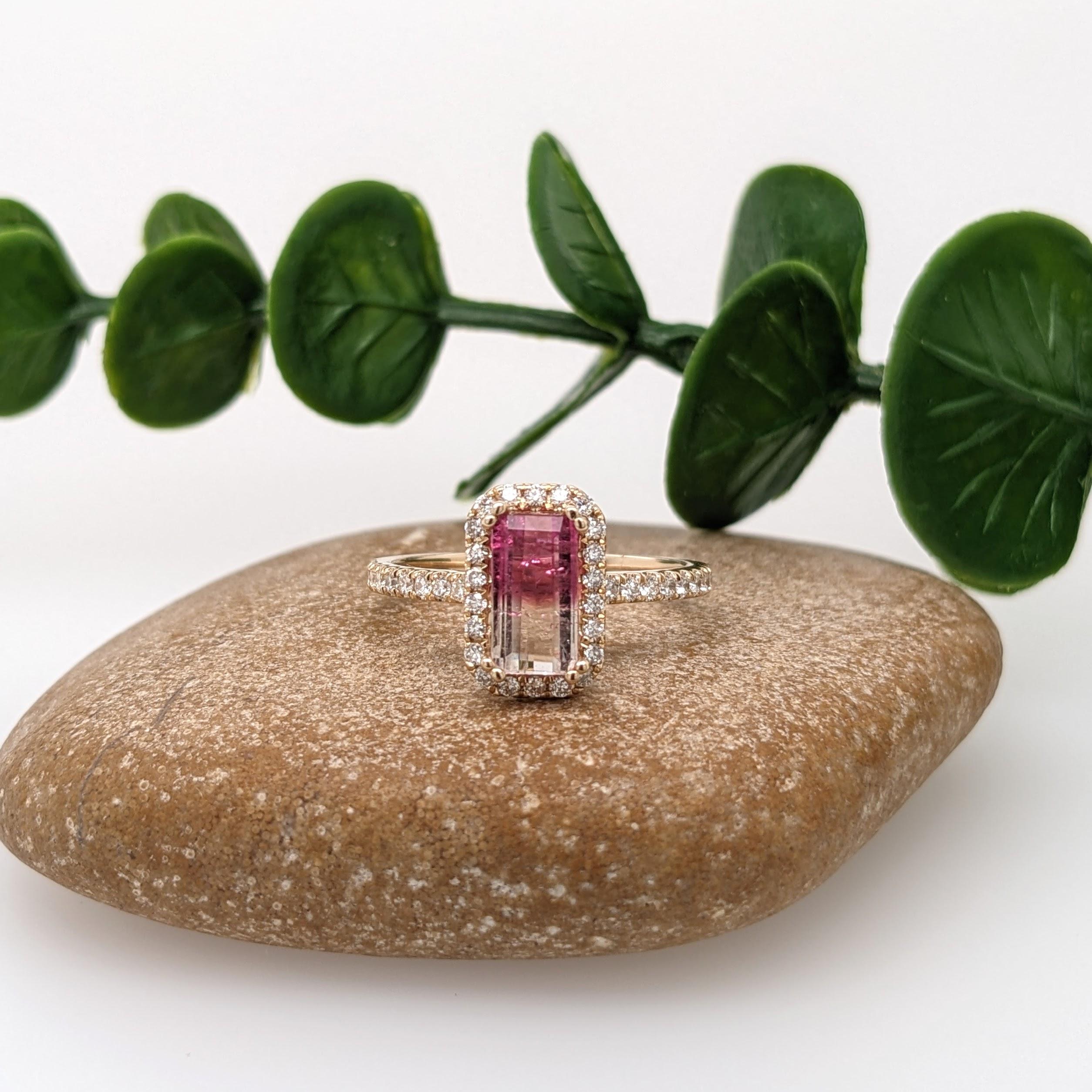 This ring features a beautiful pink and white bi-color tourmaline in a classic NNJ Designs halo ring setting with sparkling natural diamonds all set in 14k yellow gold. A gorgeous modern look that's perfectly balanced between minimalist and