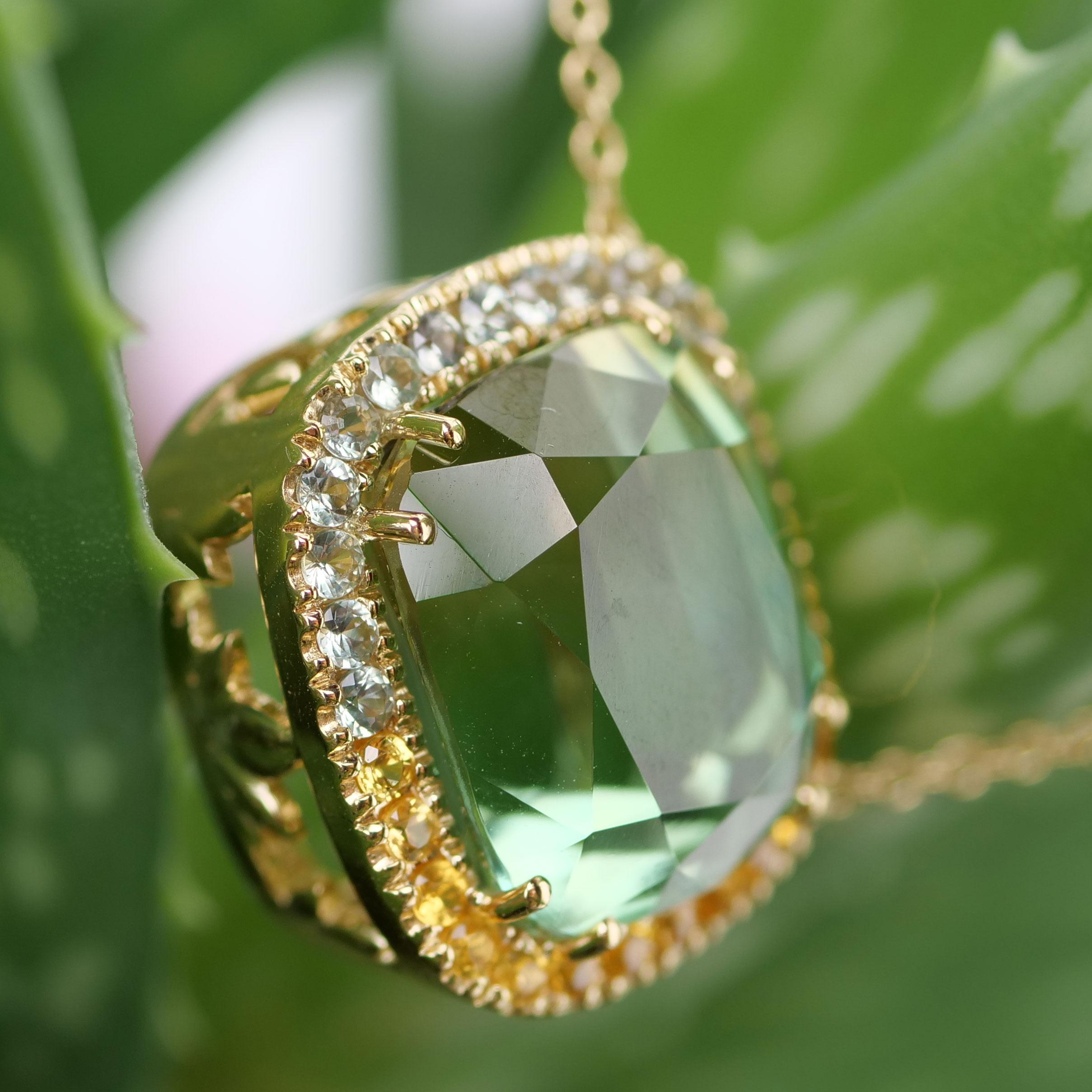 oh heavenly colors, our goldsmith company in Valenza (Italy) has created a piece of jewelry like above the clouds, this top tourmalin combines with the colored saving arranged in the course as sound to spheres, a necklace in 18 kt yellowgold, halo